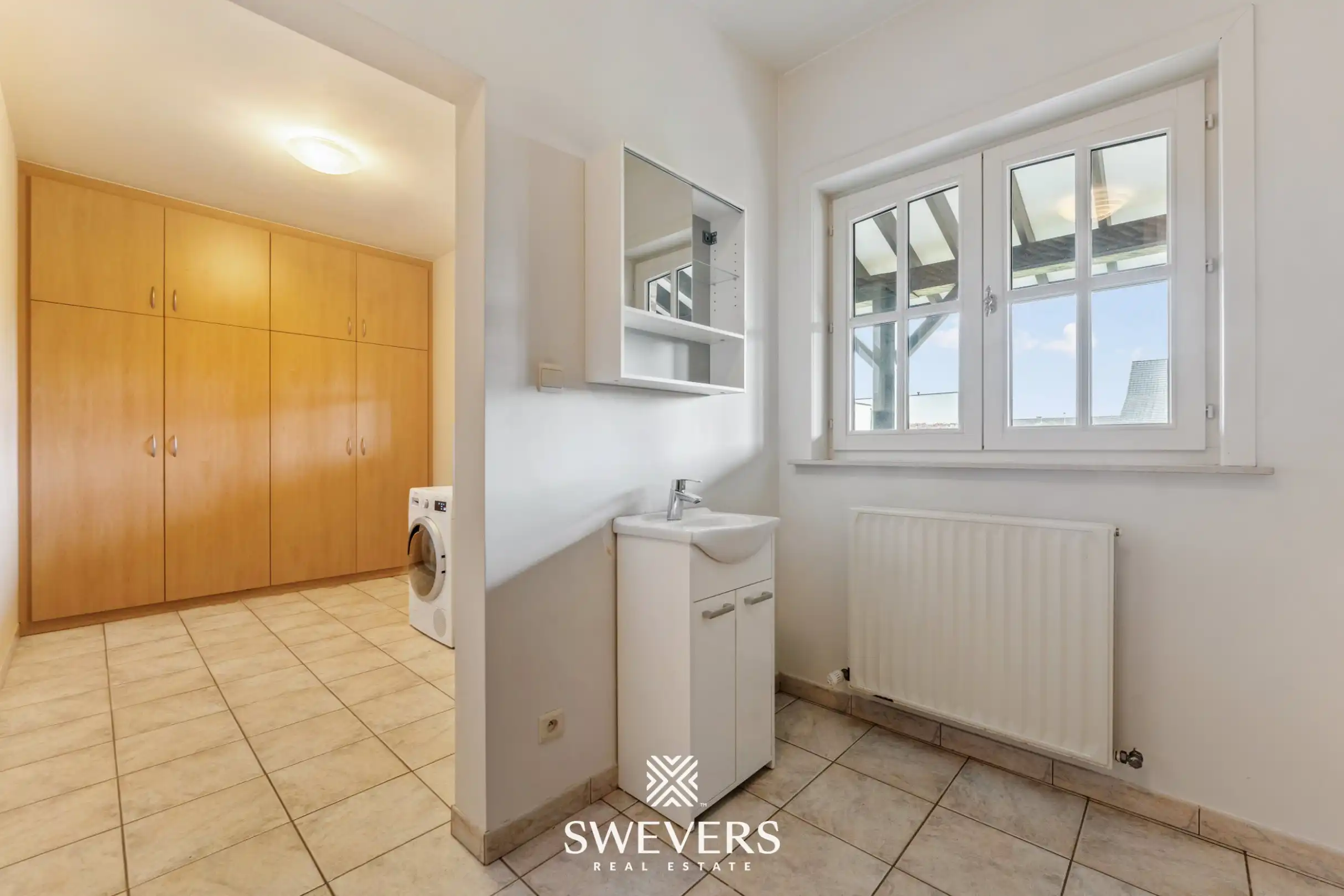 Ruime open bebouwing met 4 slaapkamers en zonnige tuin in Houthalen foto 15