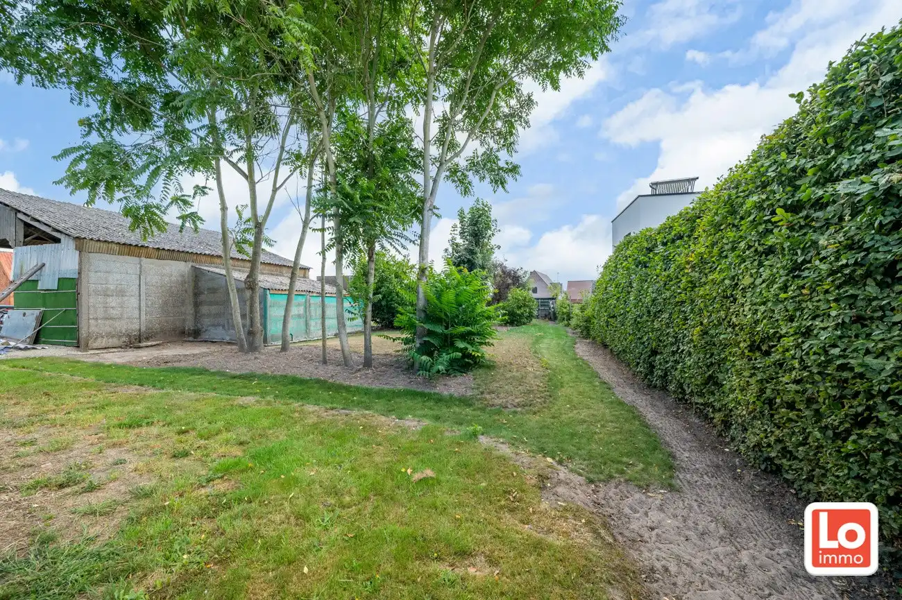 VERKOCHT! Statige open woning met ruim bijgebouw op groot perceel grond in het centrum van Kalken! foto 11