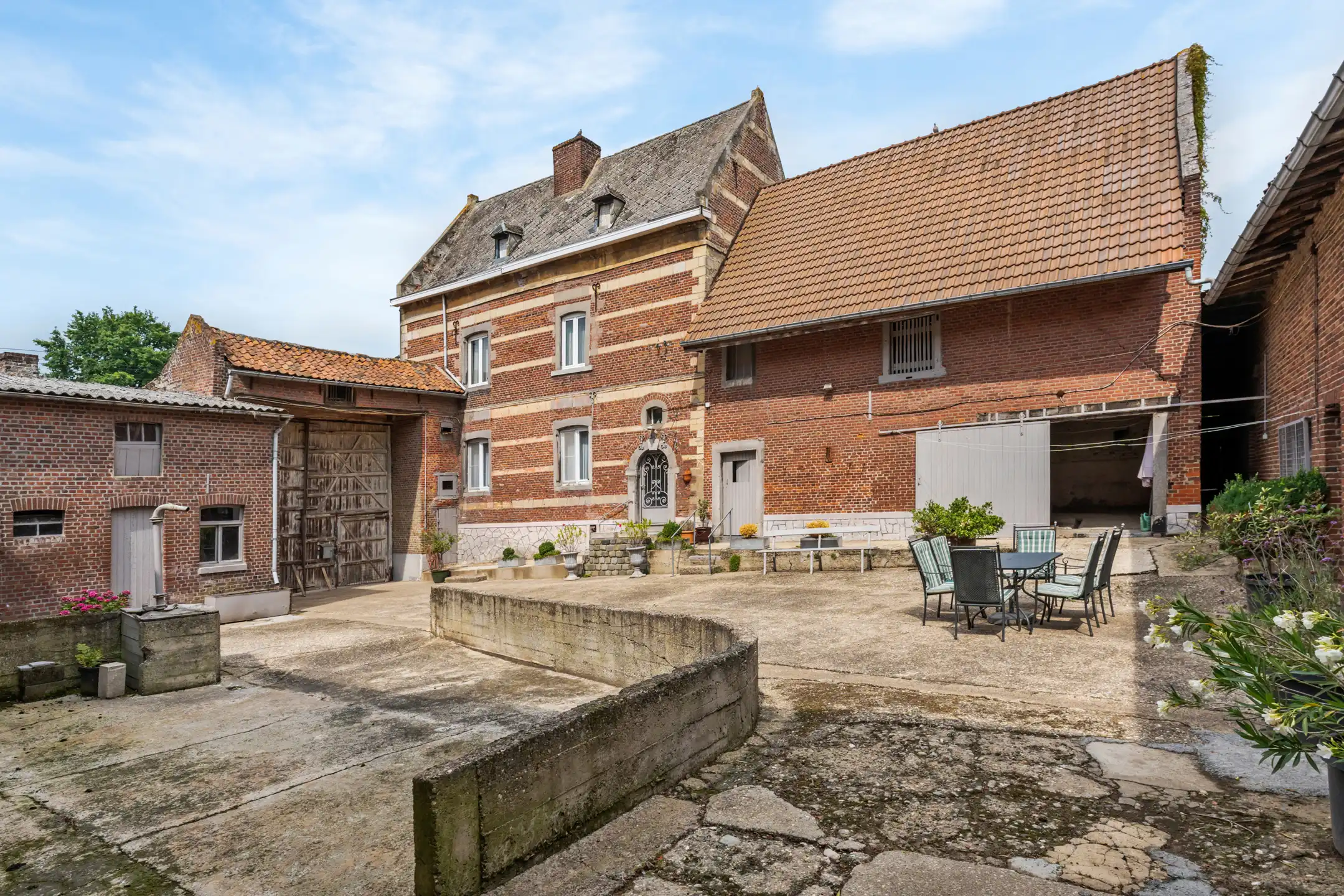 Hoofdfoto van de publicatie: Authentieke vierkantshoeve op 40a14ca te Spouwen