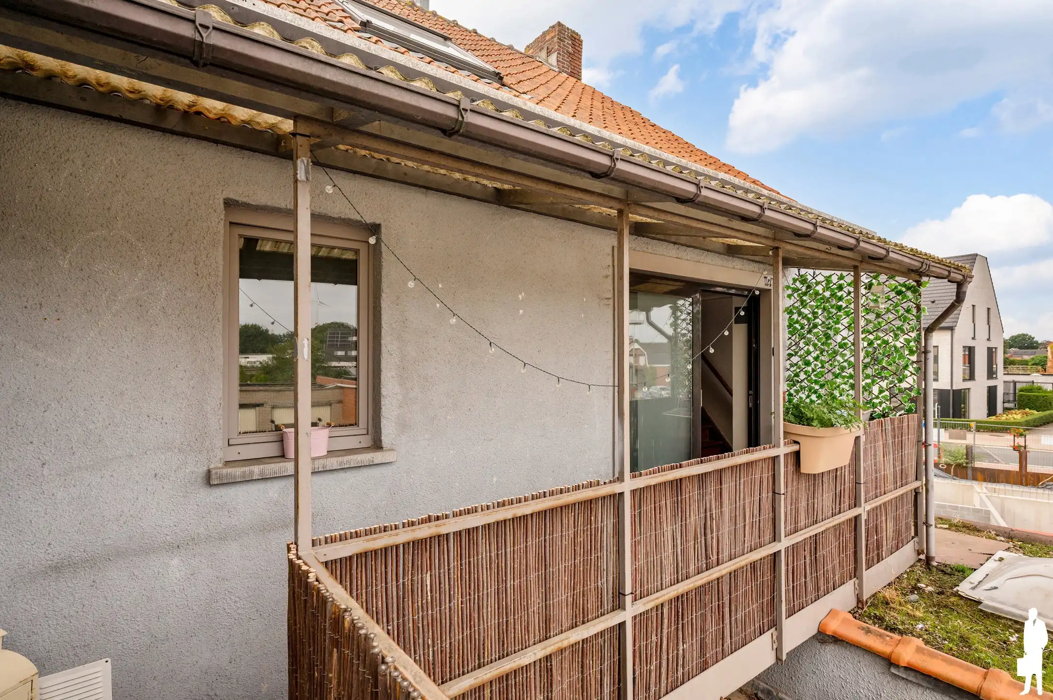 Handelspand met duplex appartement, terras en 2 garageboxen in centrum Nieuwmoer foto 25