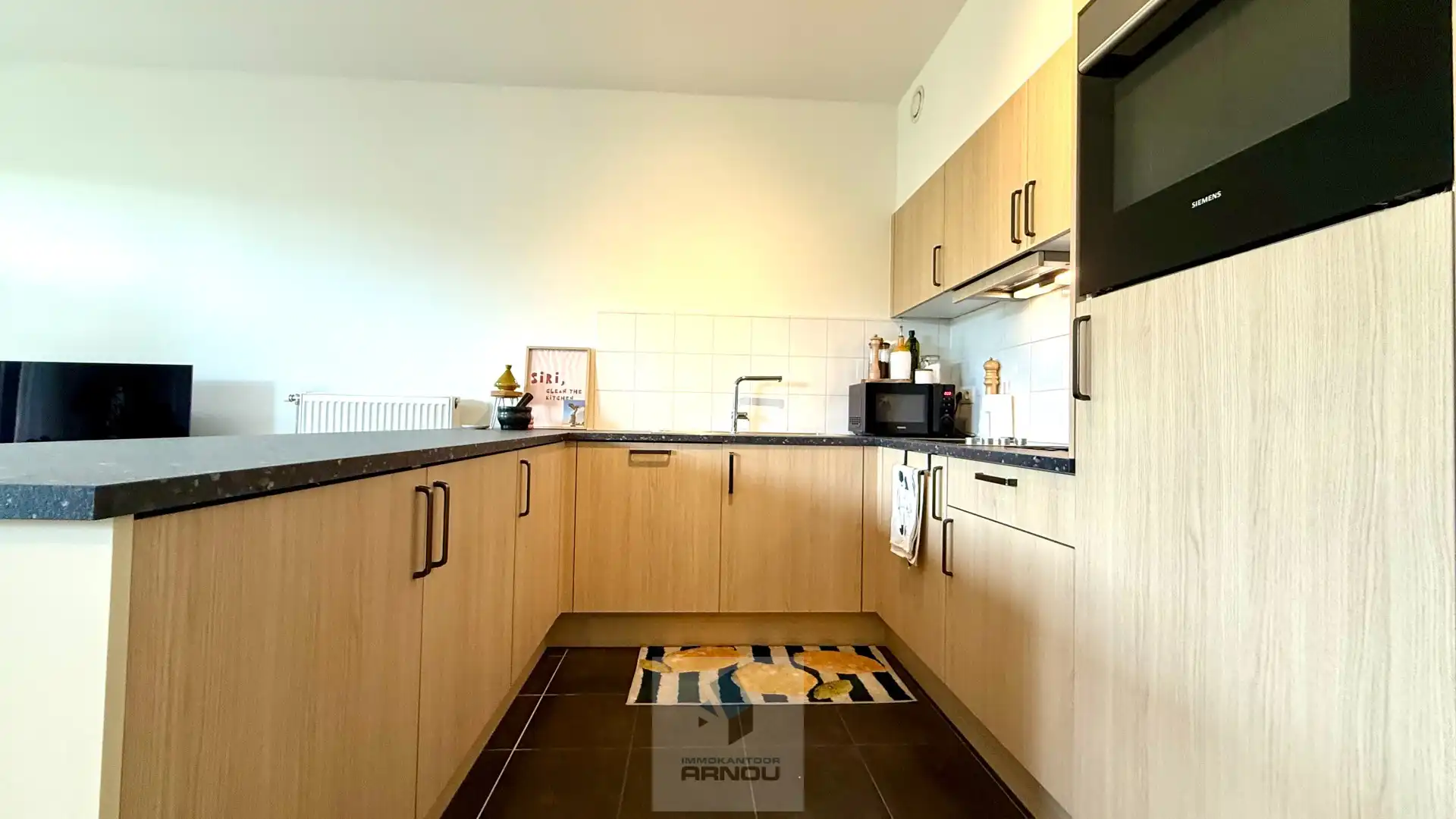 Centraal gelegen, gelijkvloers appartement met 2 slaapkamers en ruim terras met zicht op de Leie foto 8