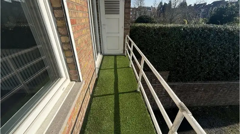 Instapklaar 2-slaapkamerappartement met TERRAS en AUTOSTANDPLAATS te koop in Kristus-Koning Brugge foto 11