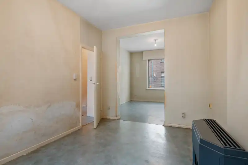 Te renoveren starterswoning met 2/3 slaapkamers en tuinjte foto 6