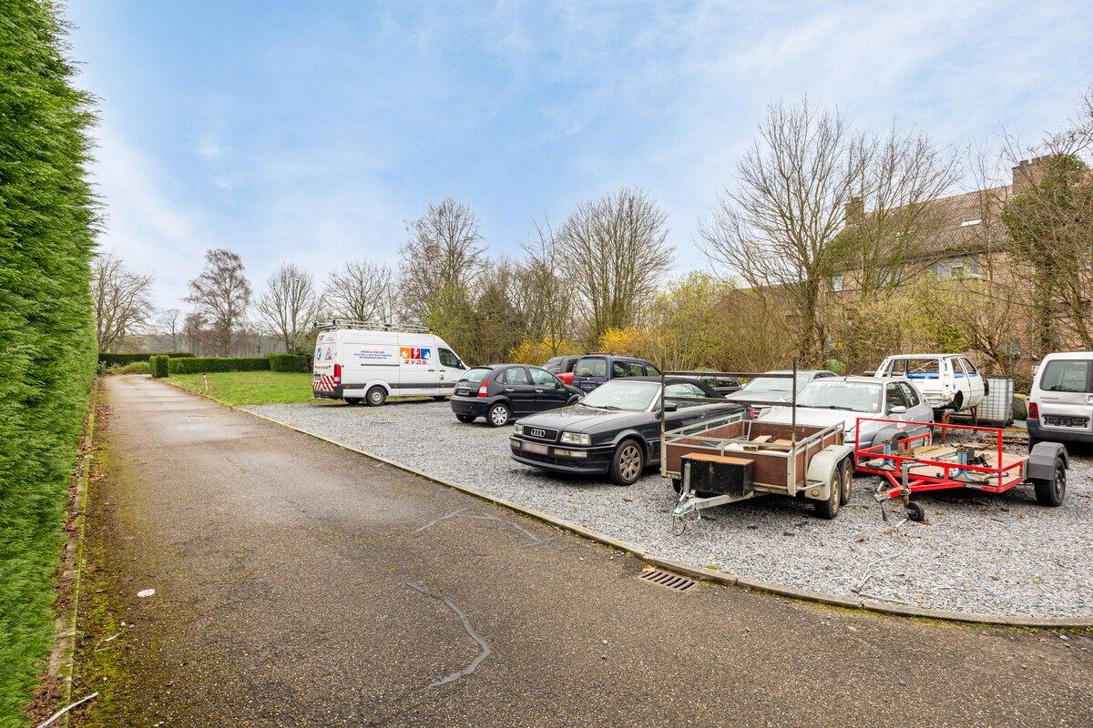 Ruim bedrijfshal met naastliggend woning op toplocatie en perceel van 65A foto 13