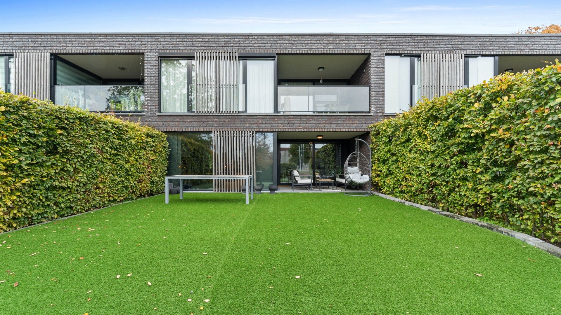 Gelijkvloers appartement met 2 slaapkamers, terras en tuin. Inclusief parking en kelderberging. foto 13