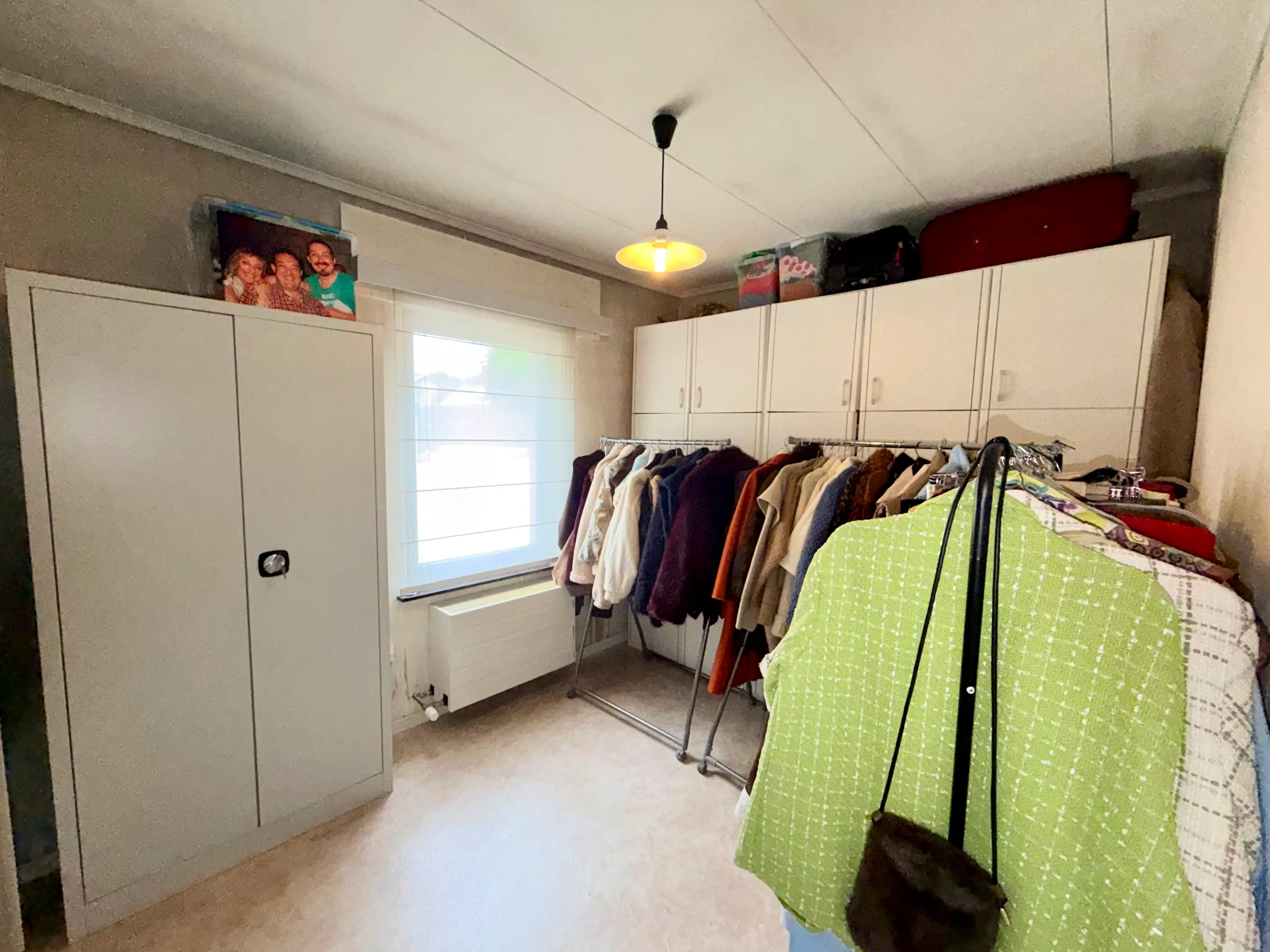 Genk, Westerwennel 25: Gelijkvloerse woning met 3 slaapkamers in een rustige woonwijk met een prachtig onderhouden tuin. foto 20