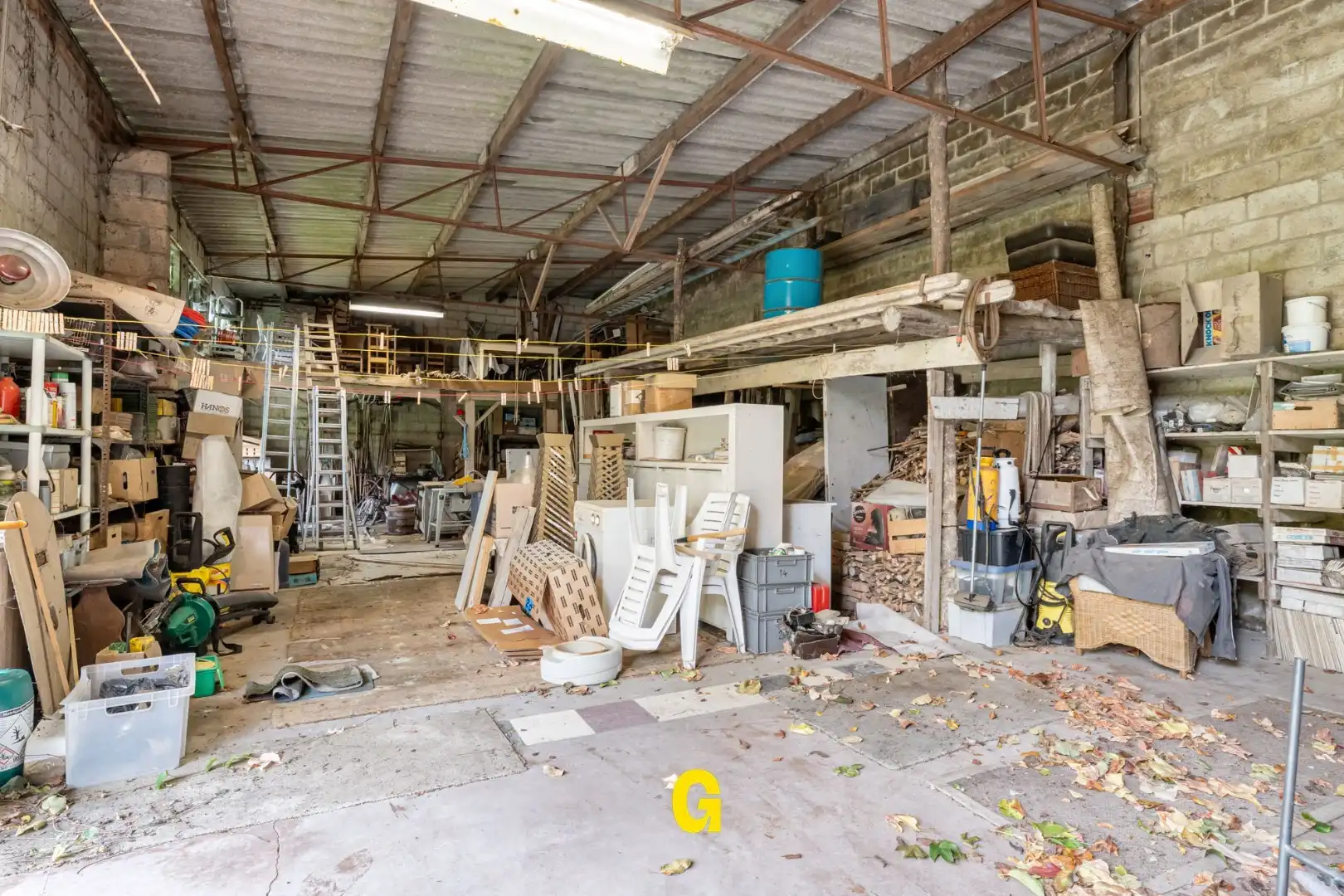 VERKOCHT - Degelijk gebouwde halfopen woning met tuin en 315 m² vergunde opslagplaatsen en garage, vlak bij het centrum van Hoeselt foto 21