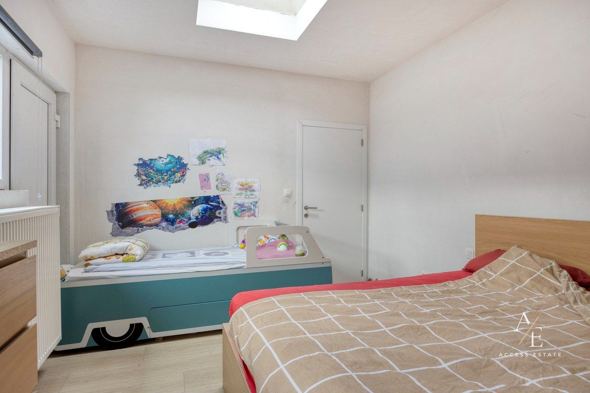 Ruime halfopen woning met potentieel in rustige straat te Melle foto 8
