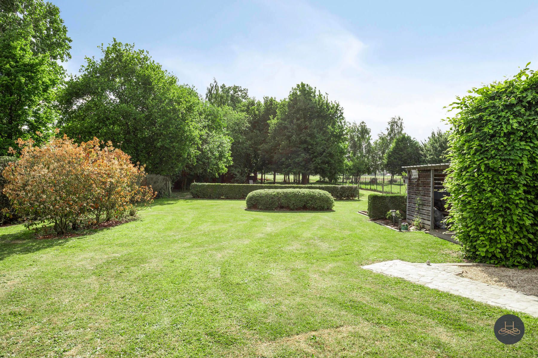 Perfect onderhouden en ruime woning met prachtige ZW tuin foto 46