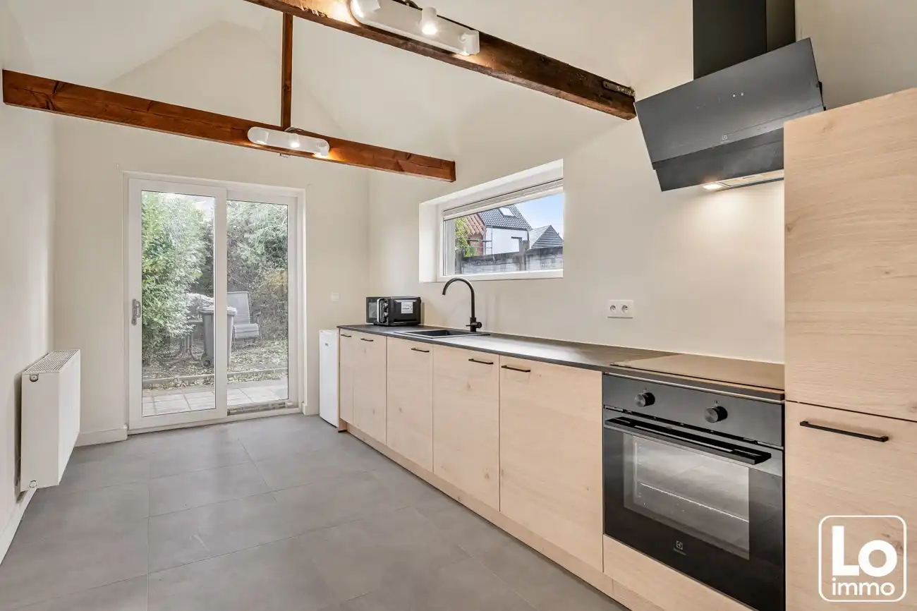 Recent gerenoveerde woning met 2 slaapkamers en zuidoost gerichte tuin in Heusden foto 5