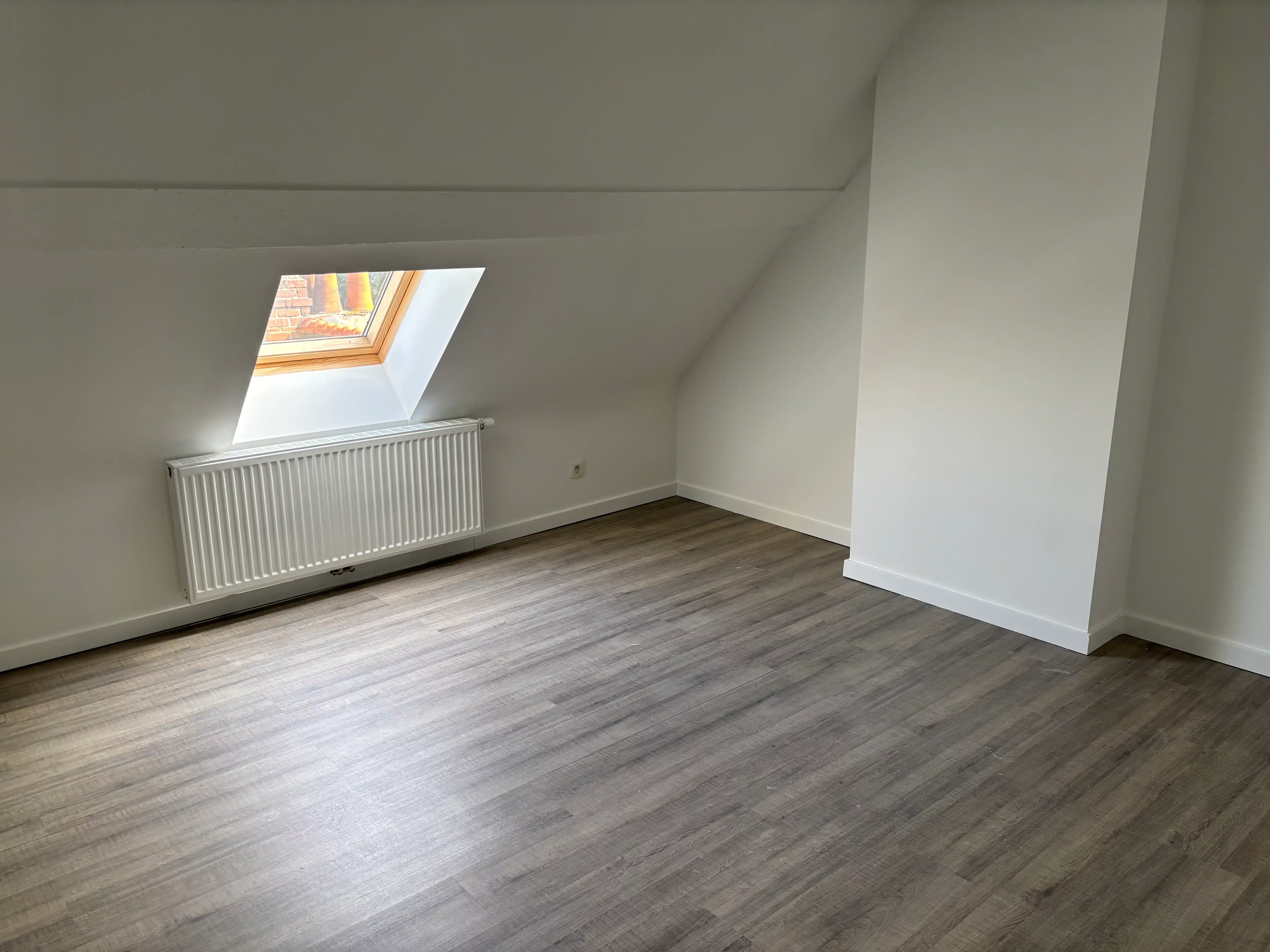 Gezellige rijwoning 4 slaapkamers + garage en stadstuin foto 17