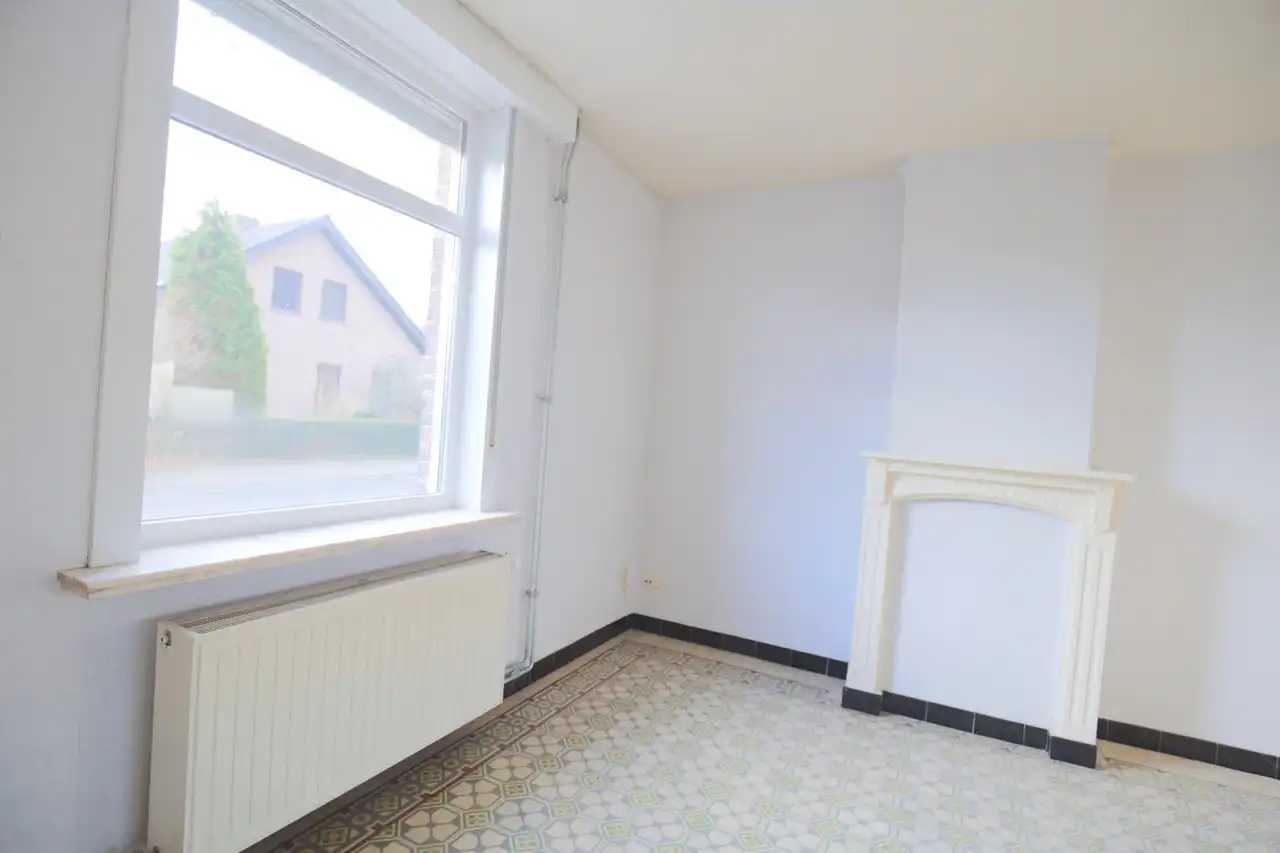 Rijwoning met terras en tuin foto 2