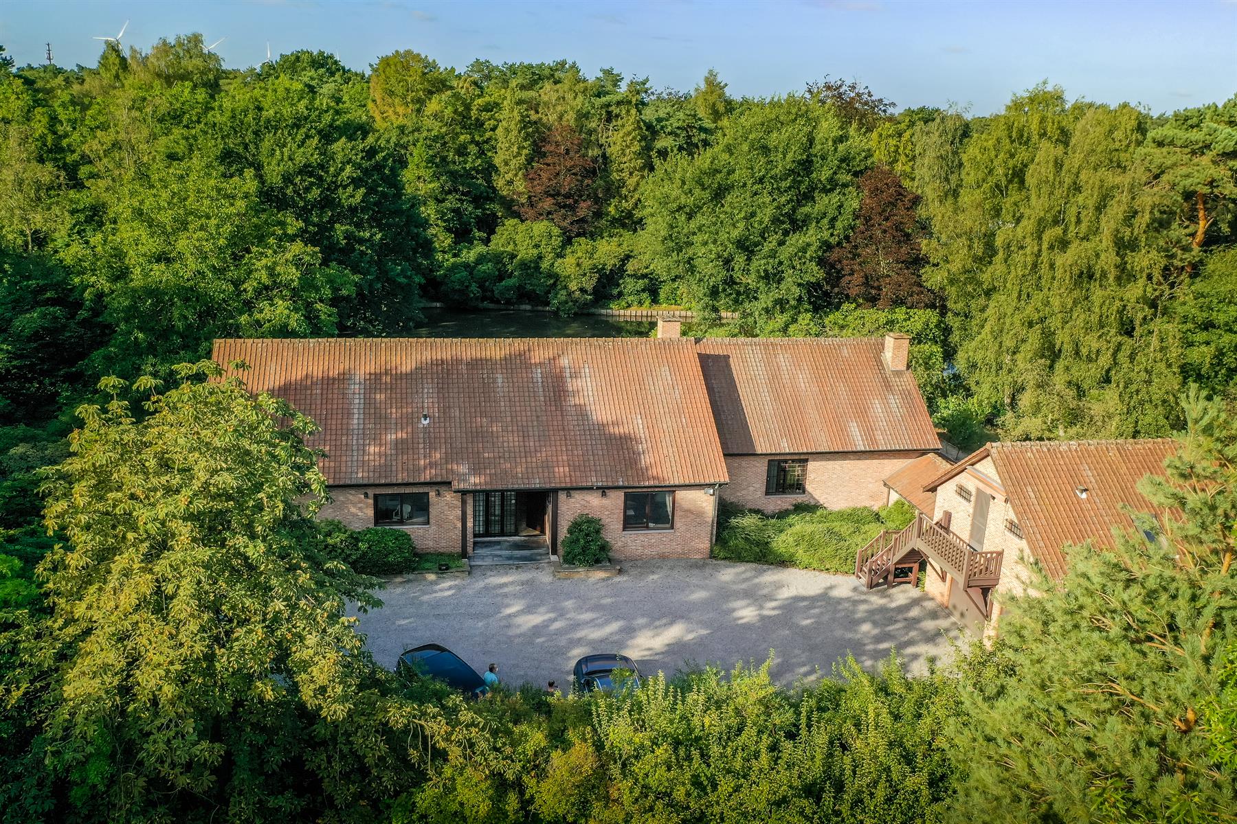 Villa in een oase van groen met zicht op waterpartij foto 2