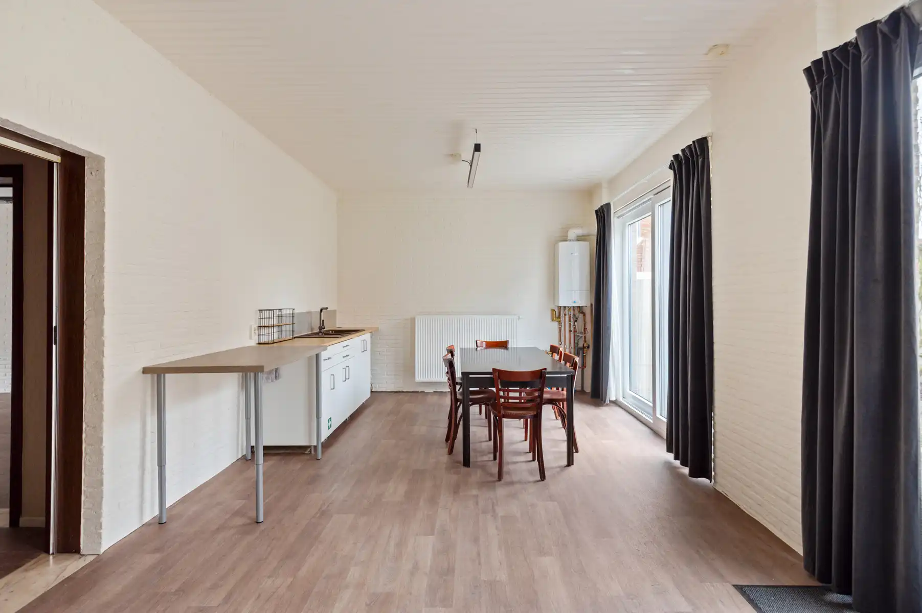 Gelijkvloers handelsruimte met koer én woonst op verdieping foto 10