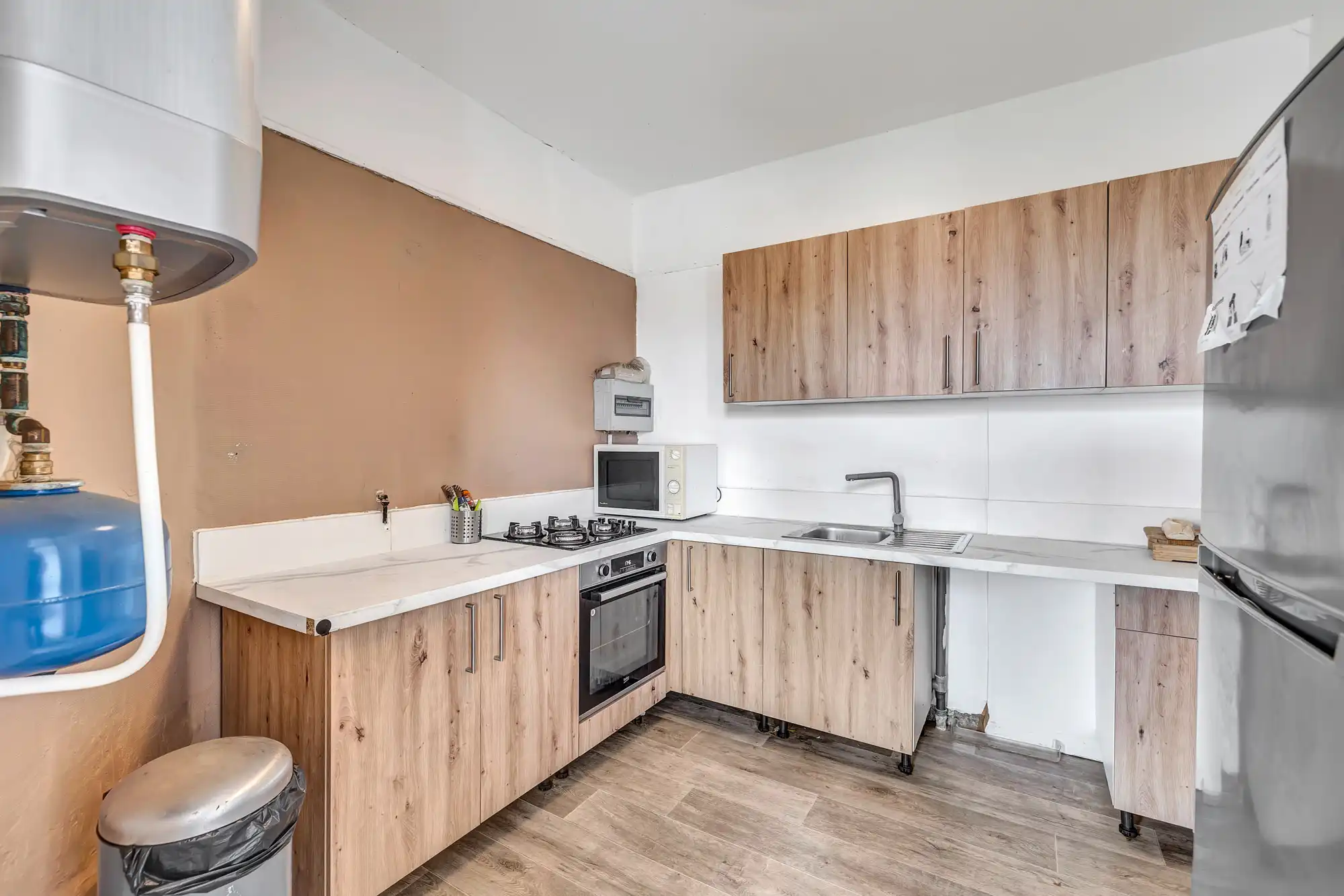 Woning ingericht in 3 appartementen te koop in Anderlecht foto 14