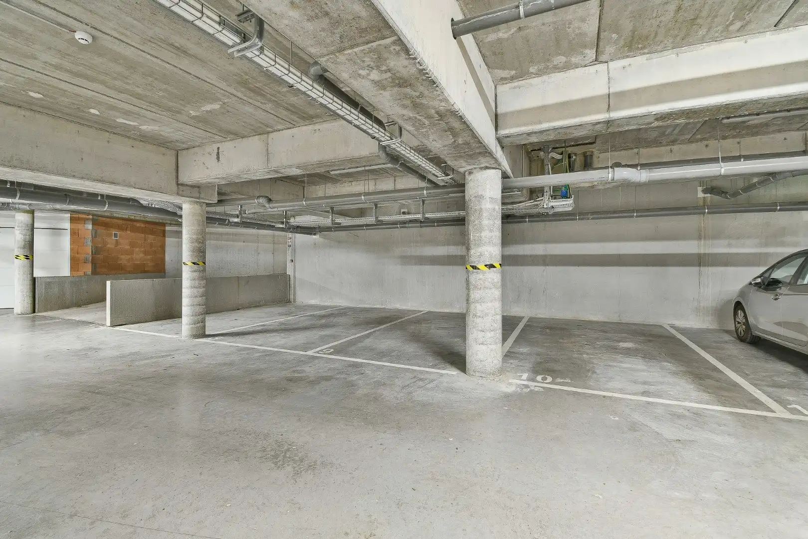 Ondergrondse parkeerplaatsen te koop in het centrum van Gistel foto 9