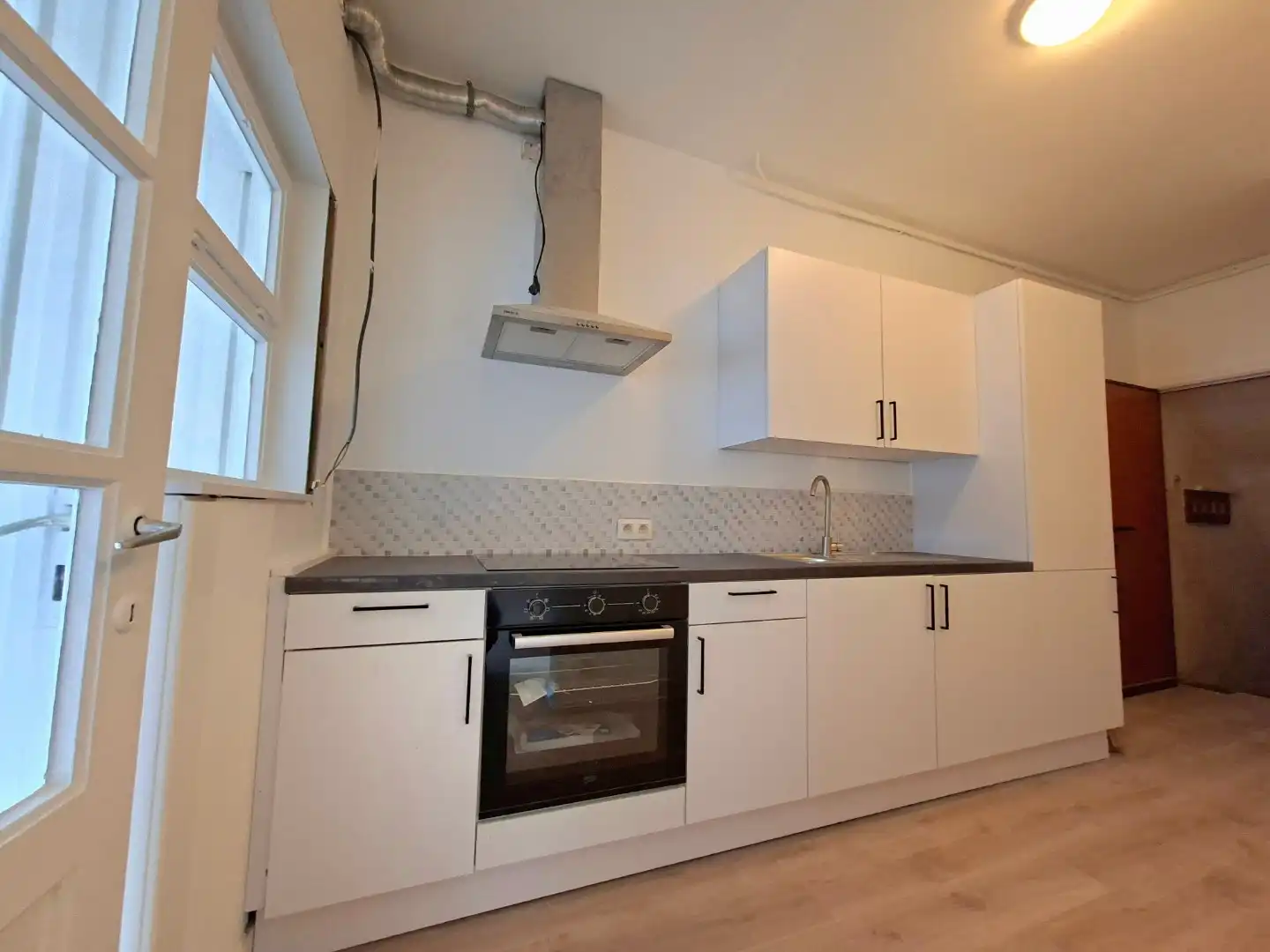 Gelijkvloersappartement met terras en garage foto 6