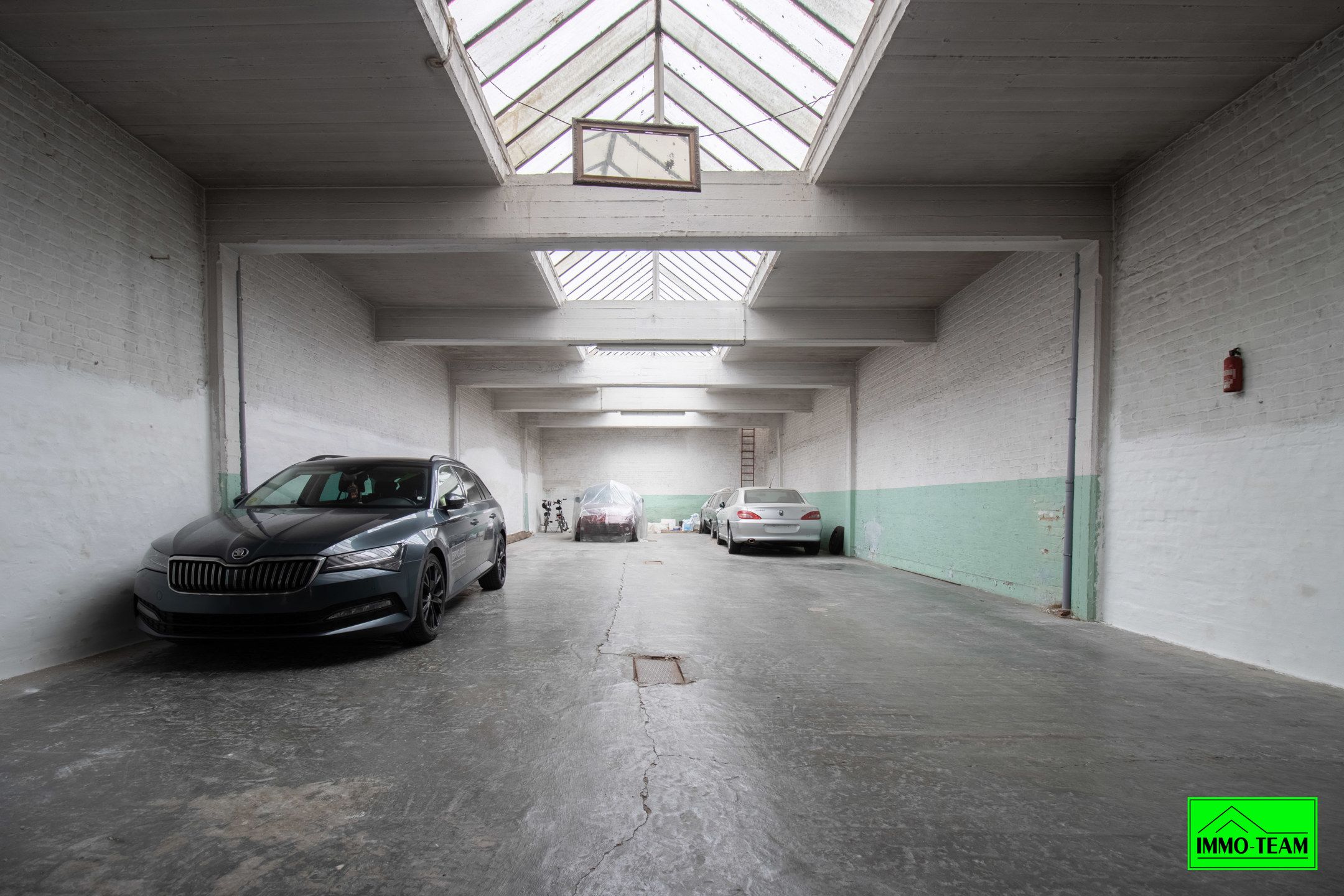 Opbrengsteigendom met 2 appartementen en autostaanplaatsen foto 23