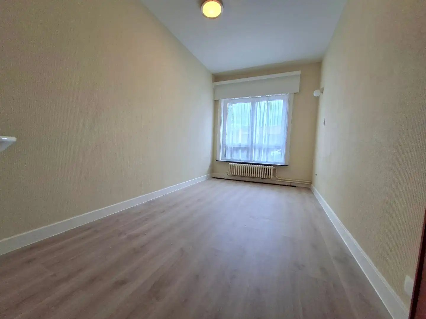 Gelijkvloersappartement met terras en garage foto 16