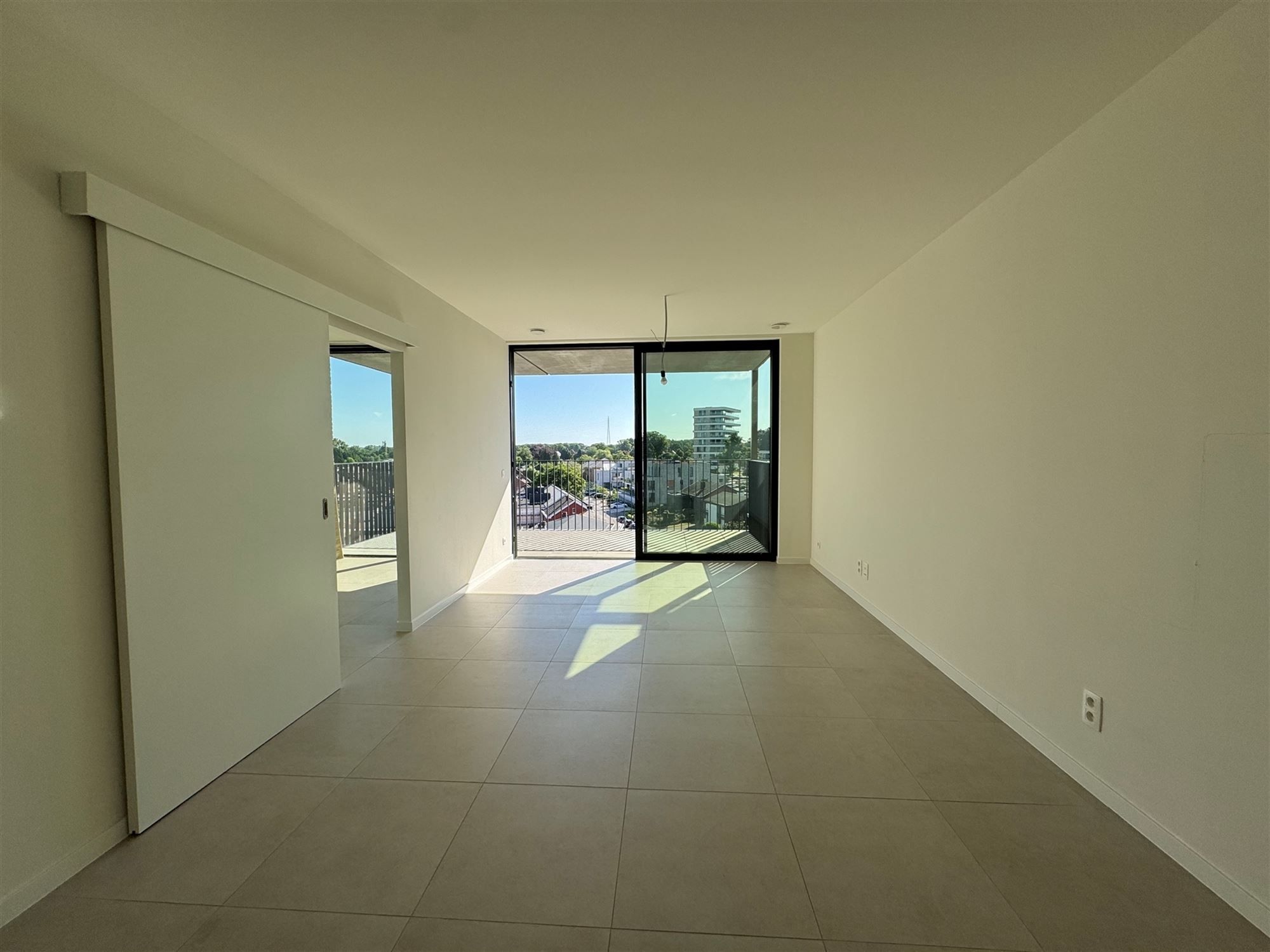 NIEUWBOUW APPARTEMENT (66M²) MET 1 SLAAPKAMER EN RUIM TERRAS TE BERINGEN CENTRUM  foto 4