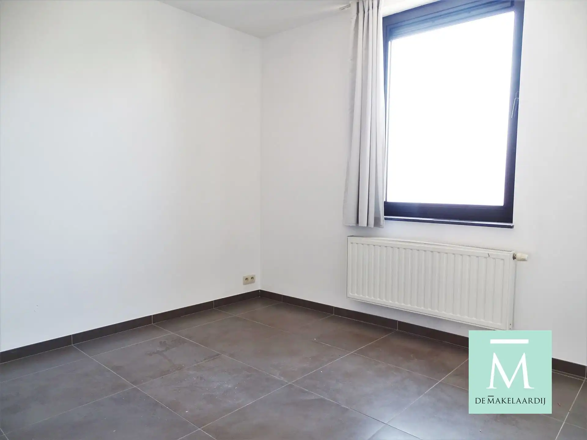 Mooi duplex appartement in centrum SKW met 2 slpkrs en tuin foto 11