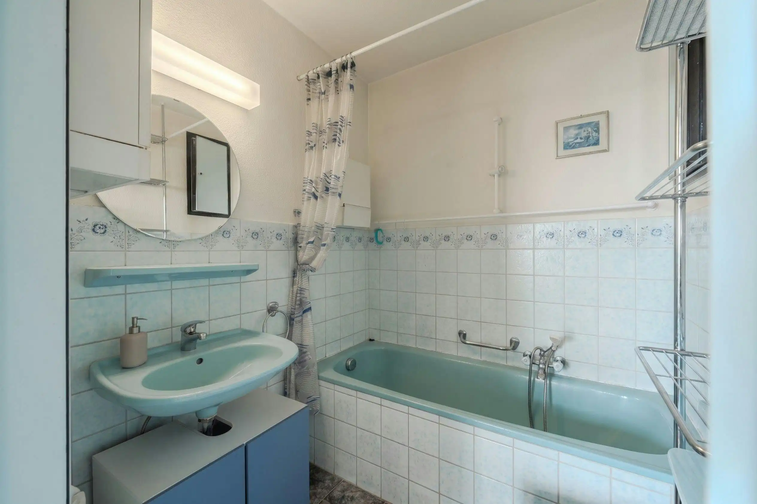 Lichtrijke hoekstudio te koop in centrum Middelkerke! foto 10