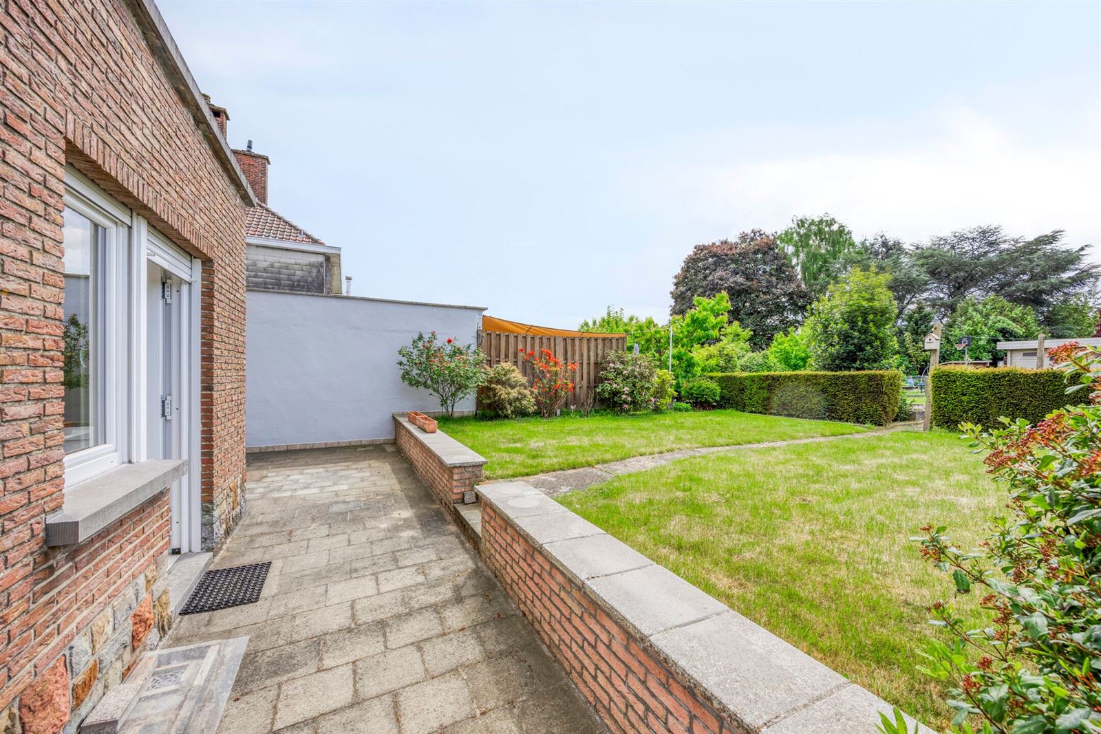 Ruime en zeer goed onderhouden 3-gevelwoning (EPC C) met garage foto 26