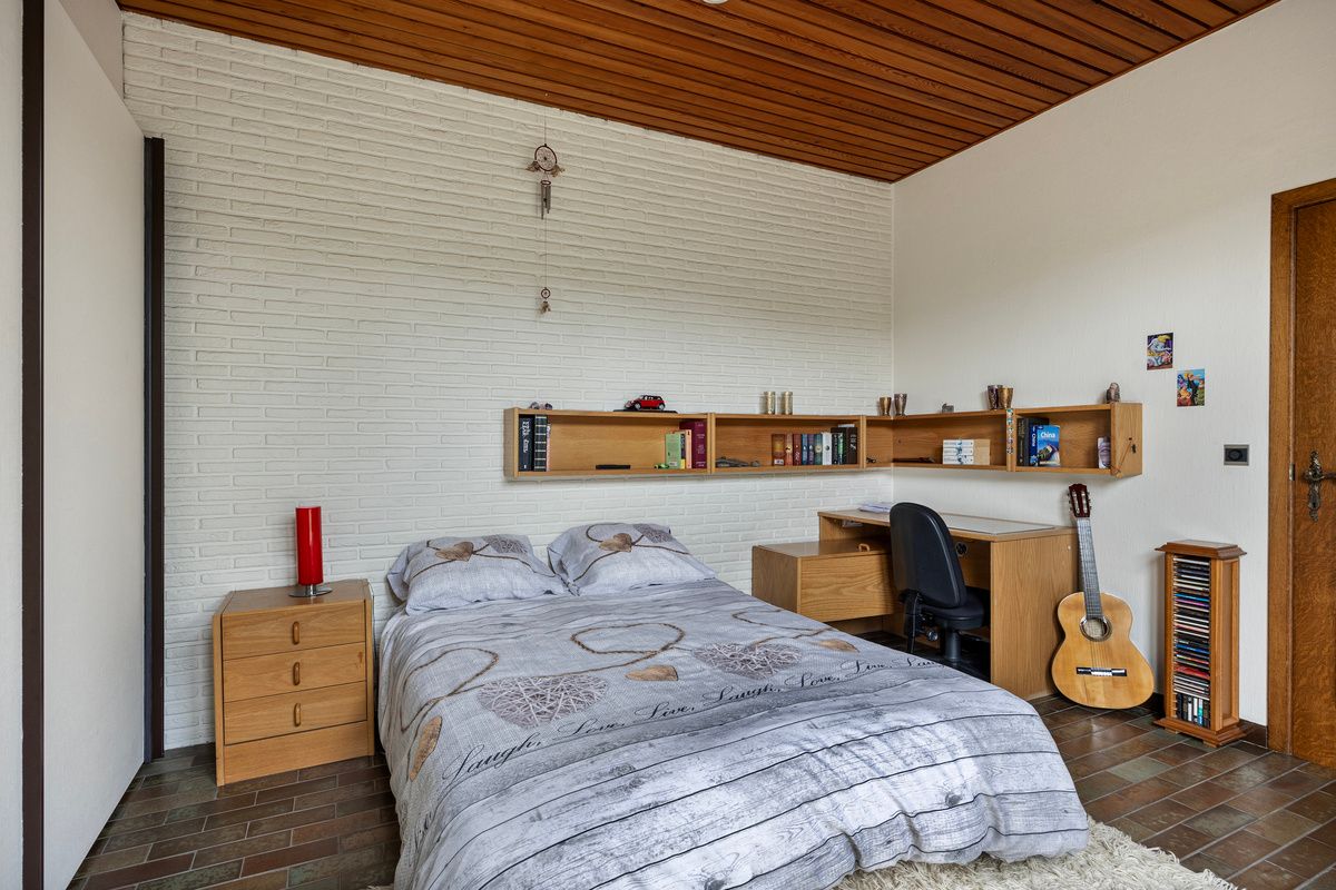 Ruime gelijkvloerse woning met bedrijfshal foto 16