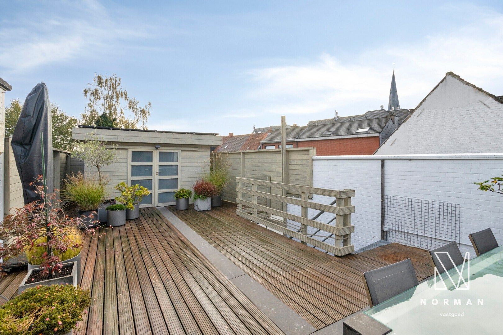 Duplex te koop in het centrum van Kuurne met 3 slaapkamers en een groot zongericht terras met tuinhuis.  foto 27