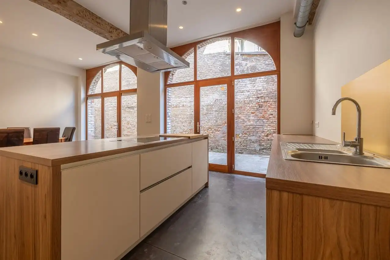 Ruim gelijkvloers appartement met zonnige tuin op toplocatie foto 10