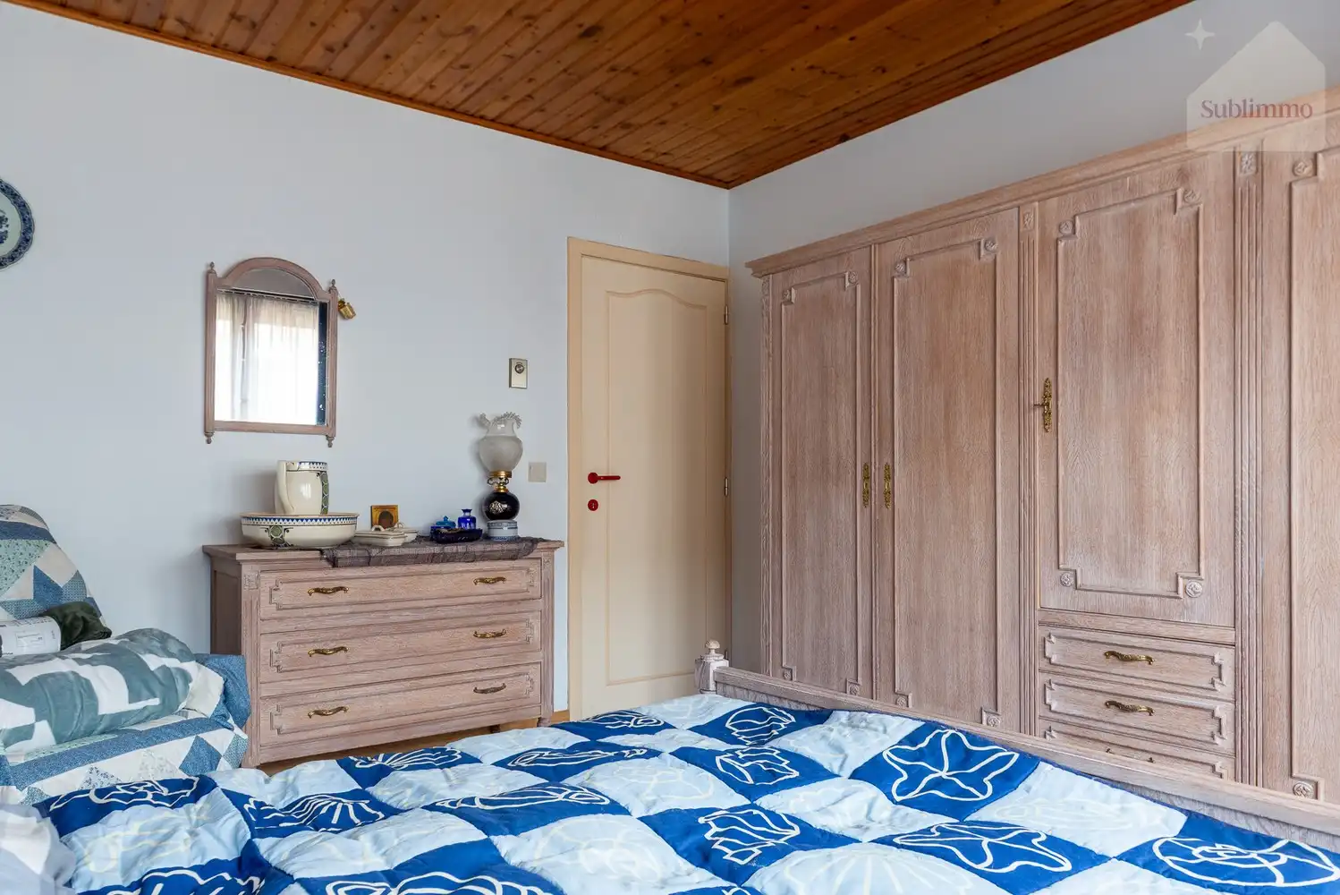 Opbrengsteigendom met 2 appartementen, tuin en garages te koop in Mol centrum foto 13