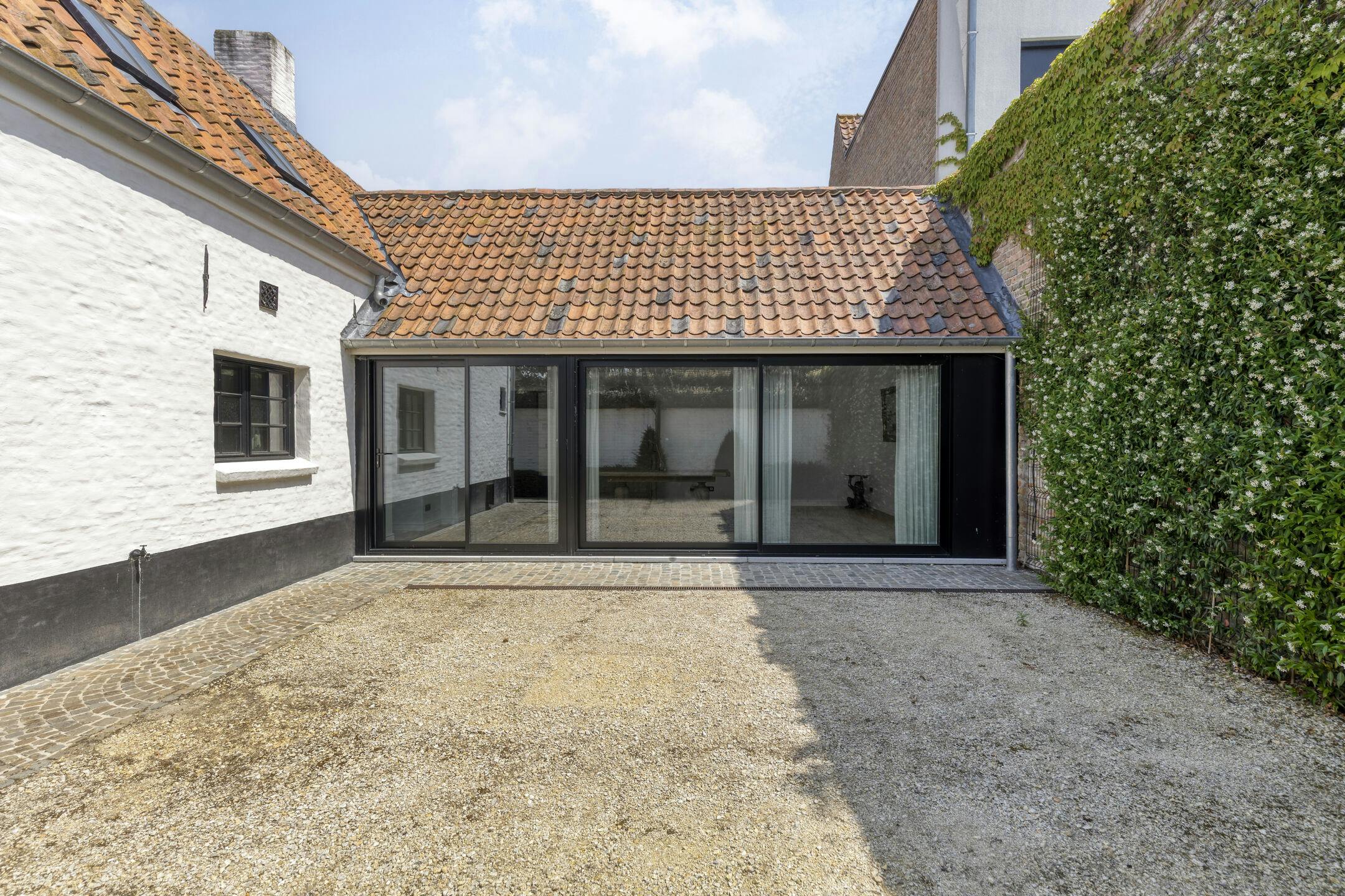 Uitzonderlijk huis in hartje Damme foto 23