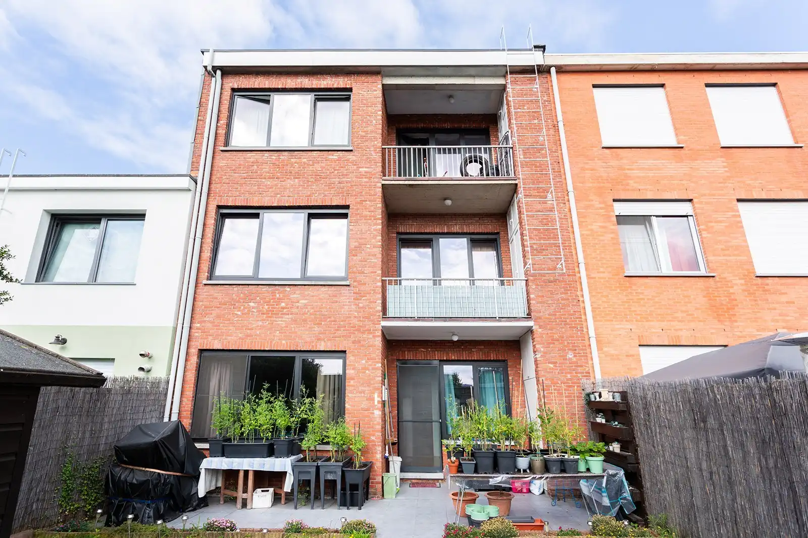 Opbrengsteigendom met 6 appartementen en 9 garageboxen foto 7