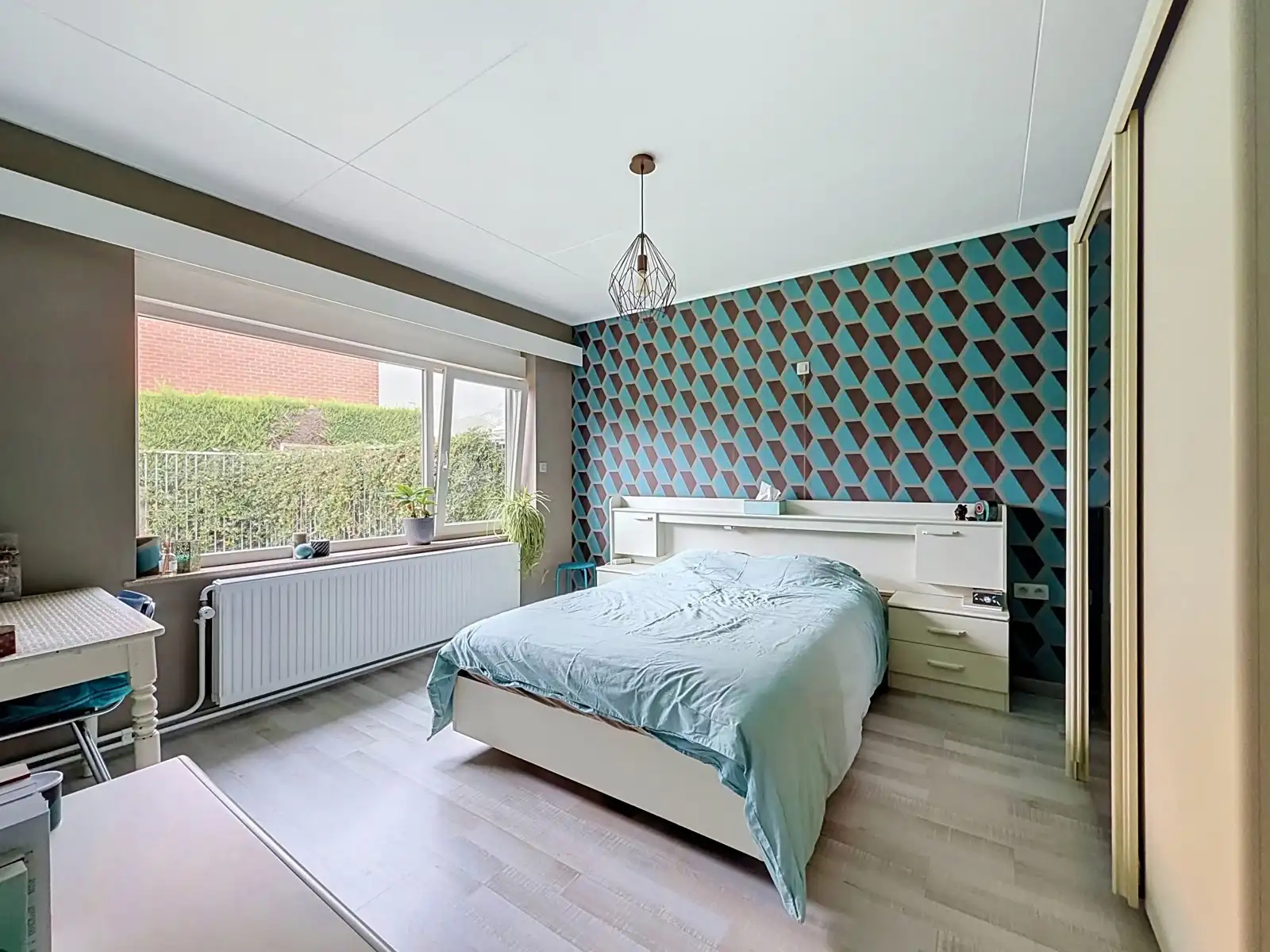 Instapklare woning met 4 SLPK, Garage én Tuin! foto 13