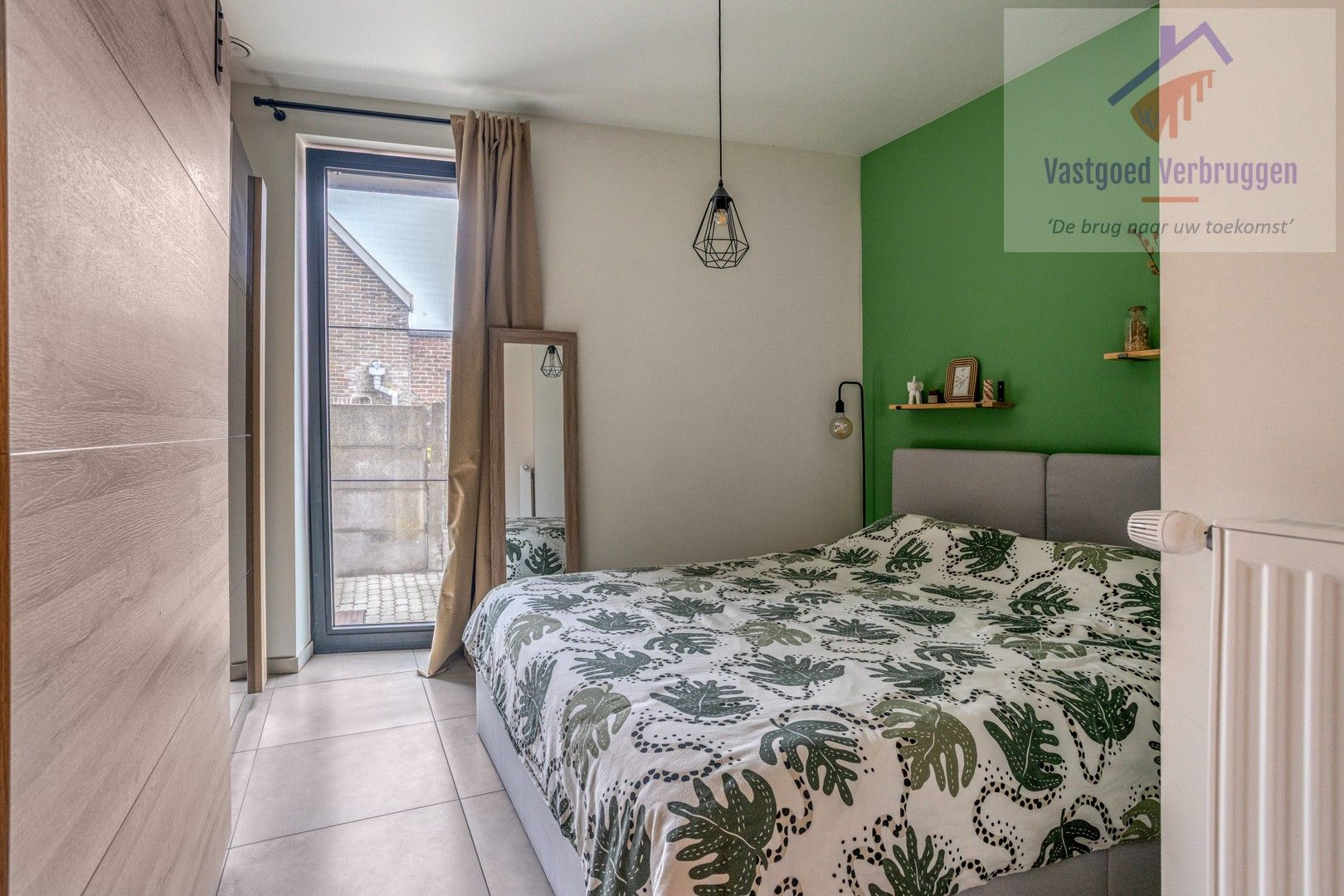 Recent gelijkvloers appartement met terras en tuin foto 11