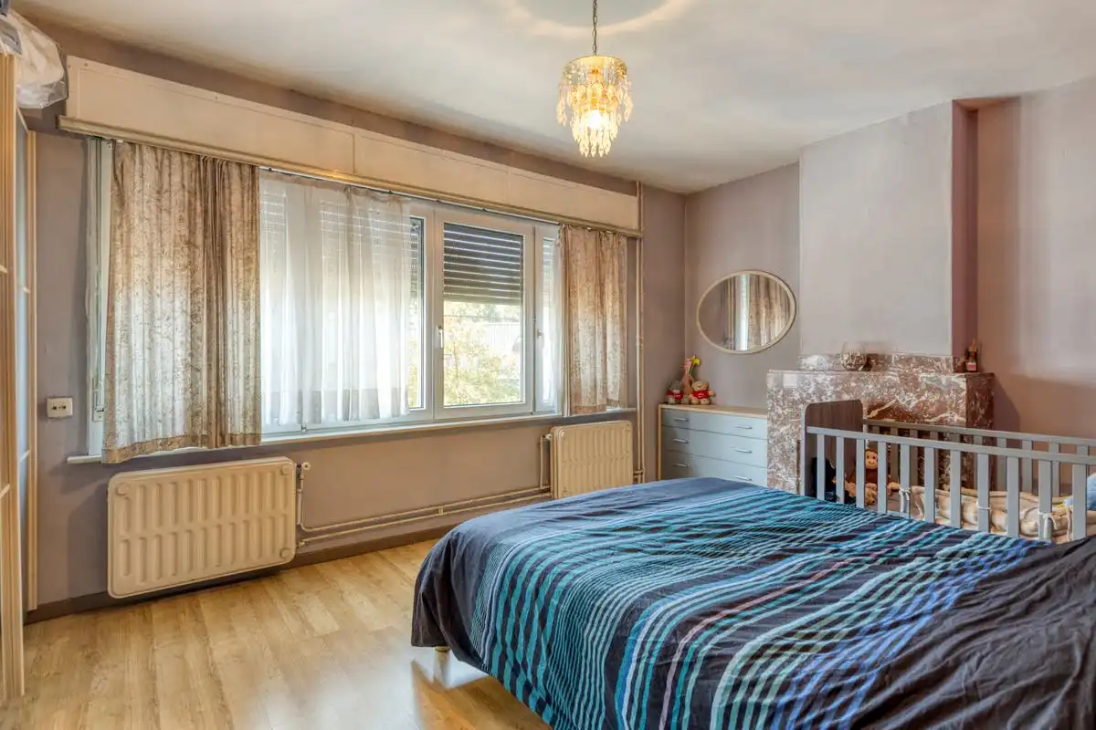 Ruime te renoveren woning met stadstuin in Mechelen foto 14