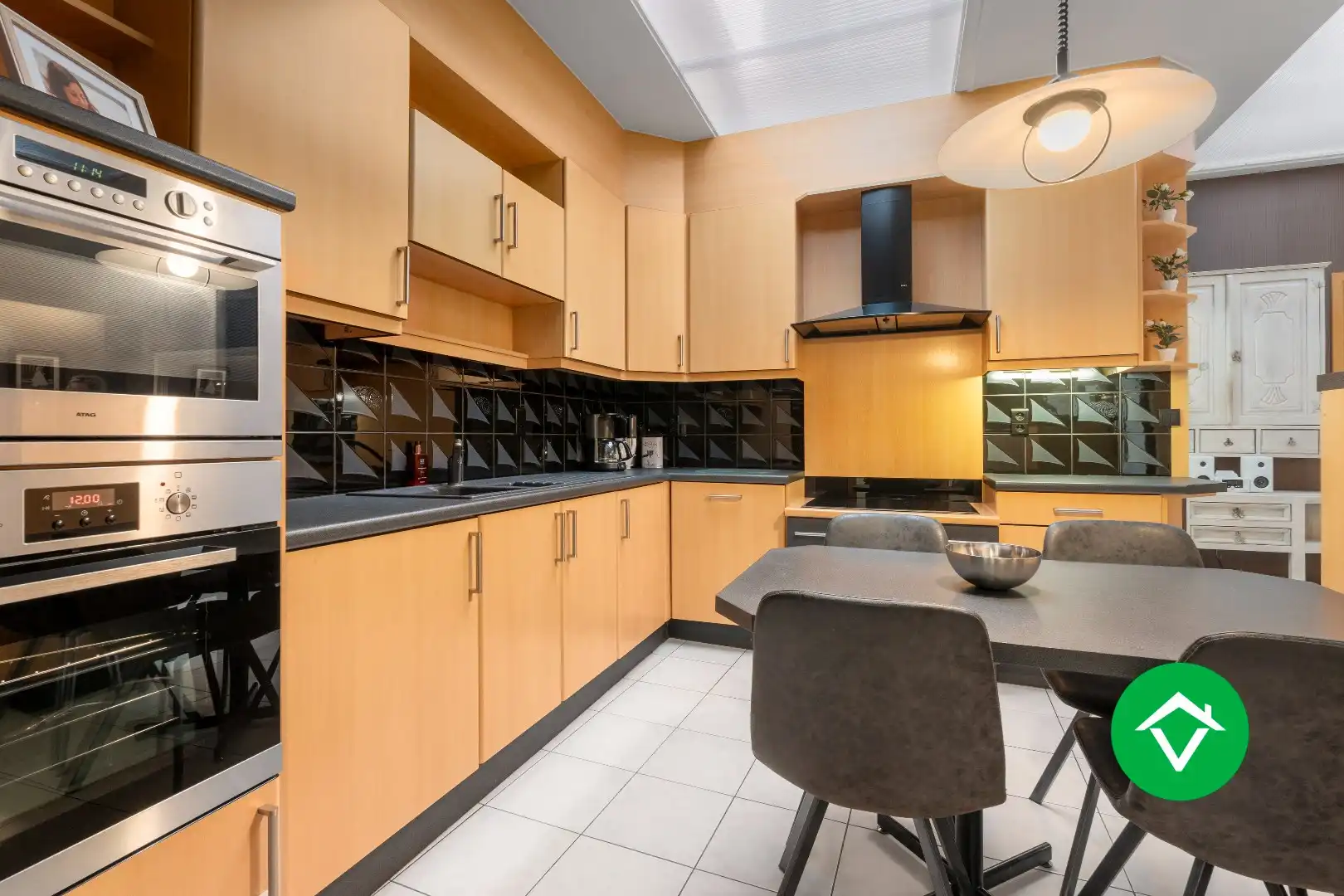 Veelzijdig handelspand met woonst en twee verhuurde appartementen in centrum Aartrijke foto 7