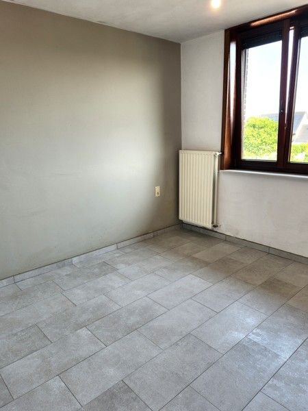 Tweeslaapkamer appartement mét garage in het centrum van Sint-Baafs-Vijve ZONDER SYNDICKOSTEN! foto 4