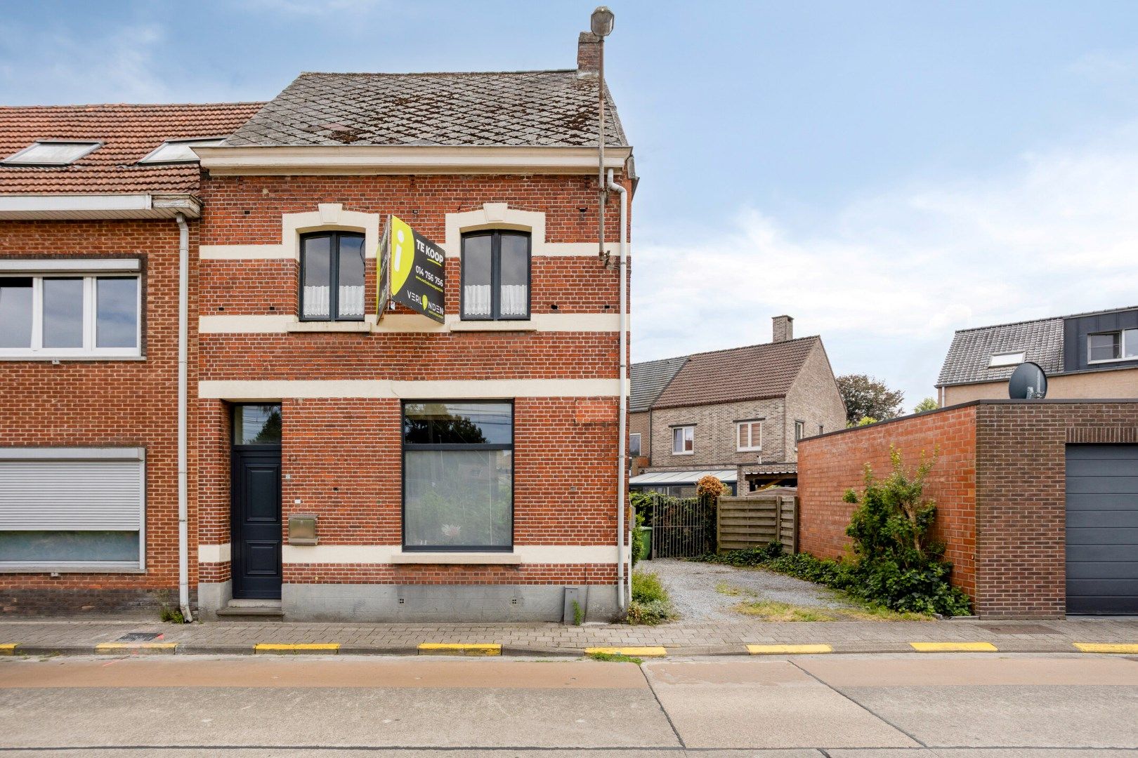 Charmante woning met 3 slpks op een perceel van 409 m²!  foto {{pictureIndex}}