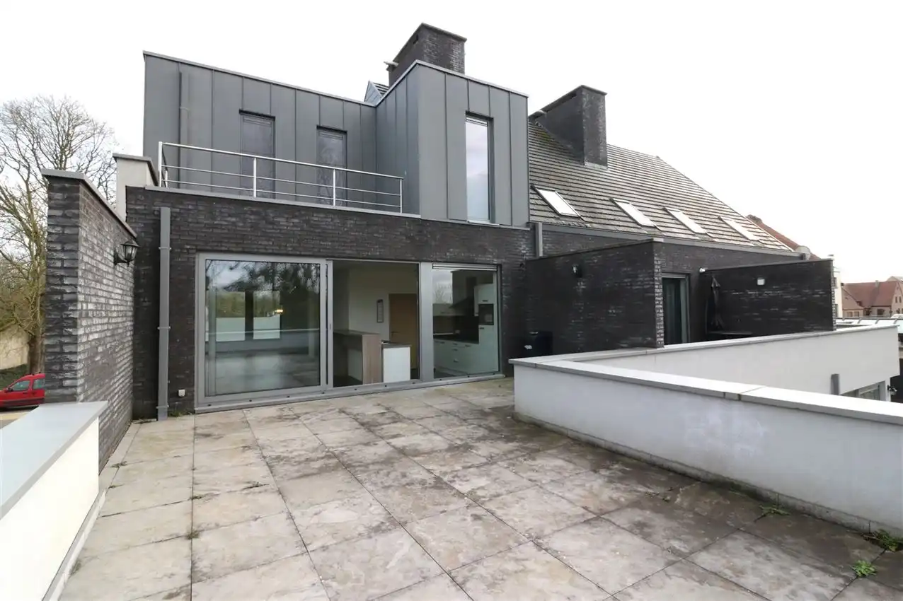 Duplex appartement met 3 slpk., terras en garage  foto 3
