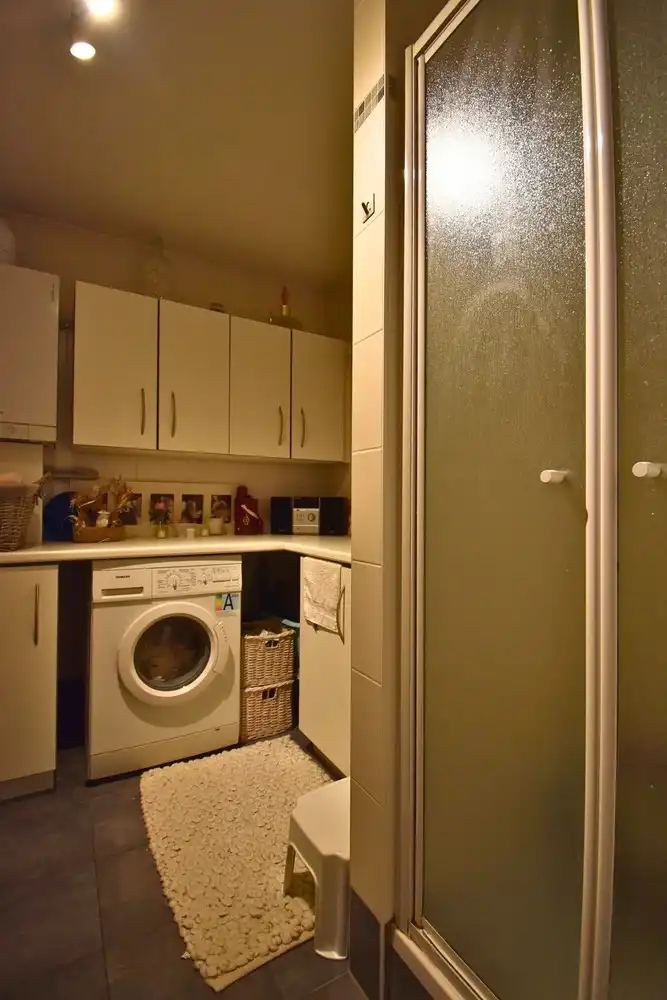 Energiezuinig appartement met 1 slaapkamer, terras, staanplaats en kelder te Sint-Pieters-Leeuw foto 6