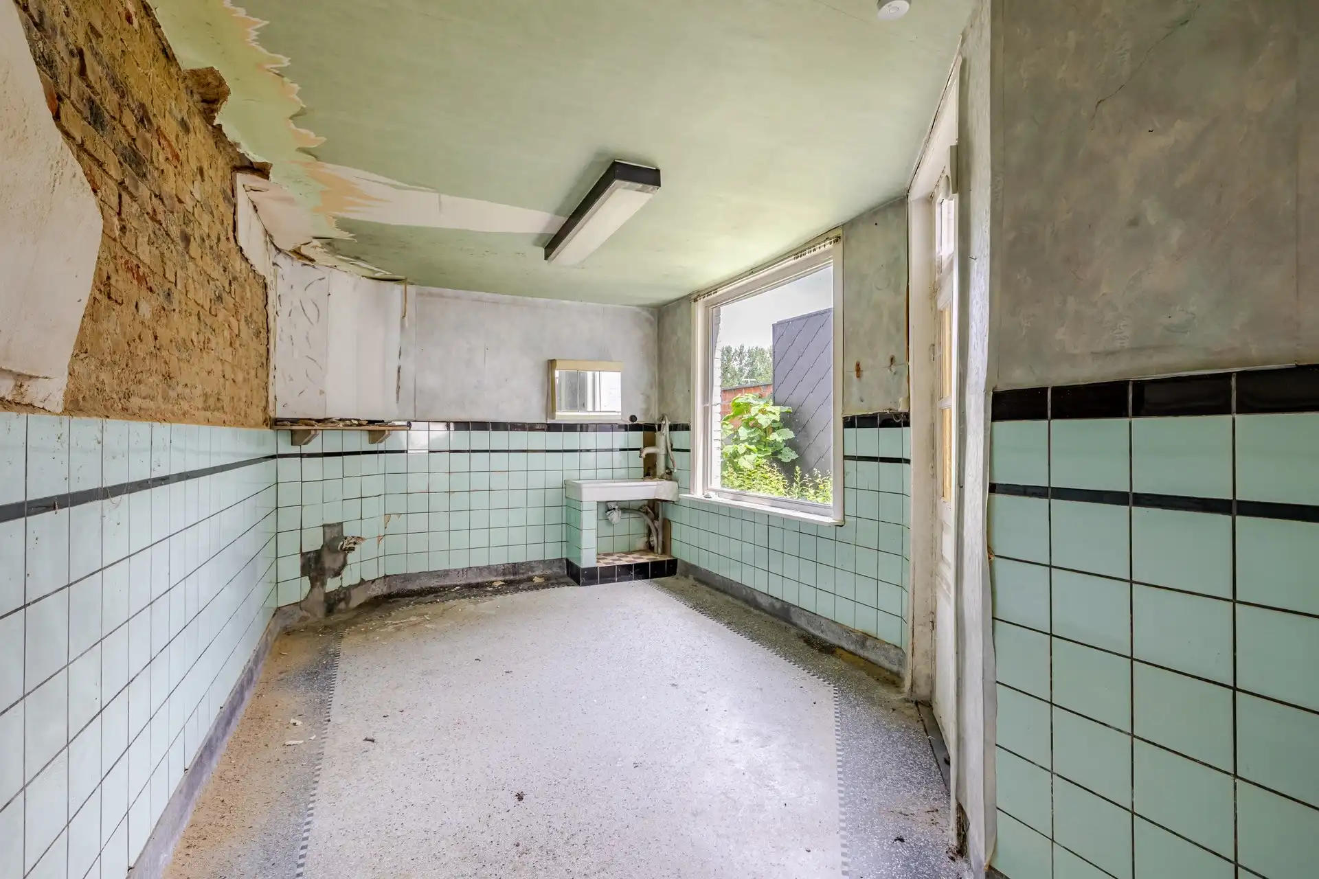 Te renoveren woning met grote tuin en garage te Haaltert foto 9