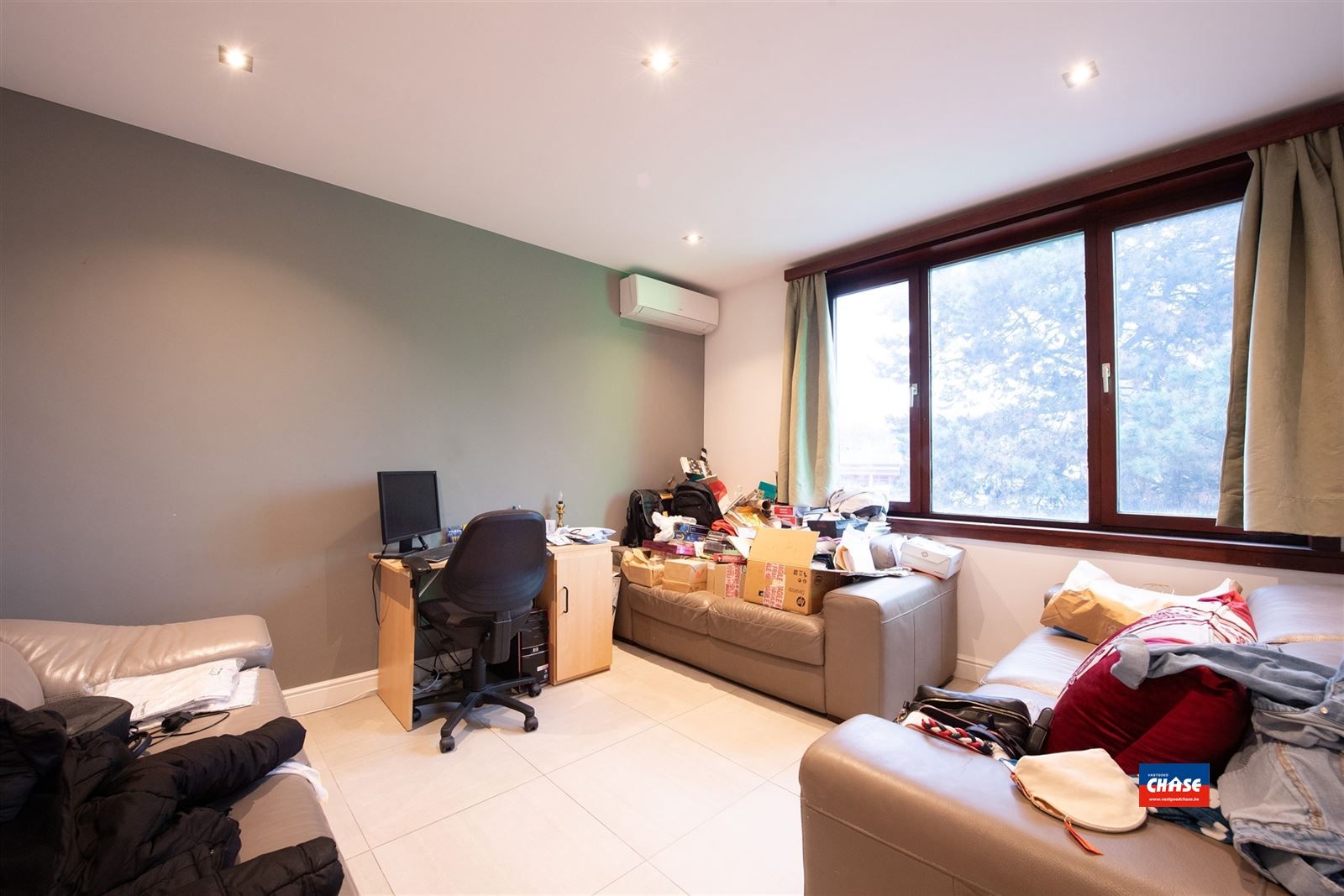 Handelshuis met groot appartement, garage en tuin foto 29