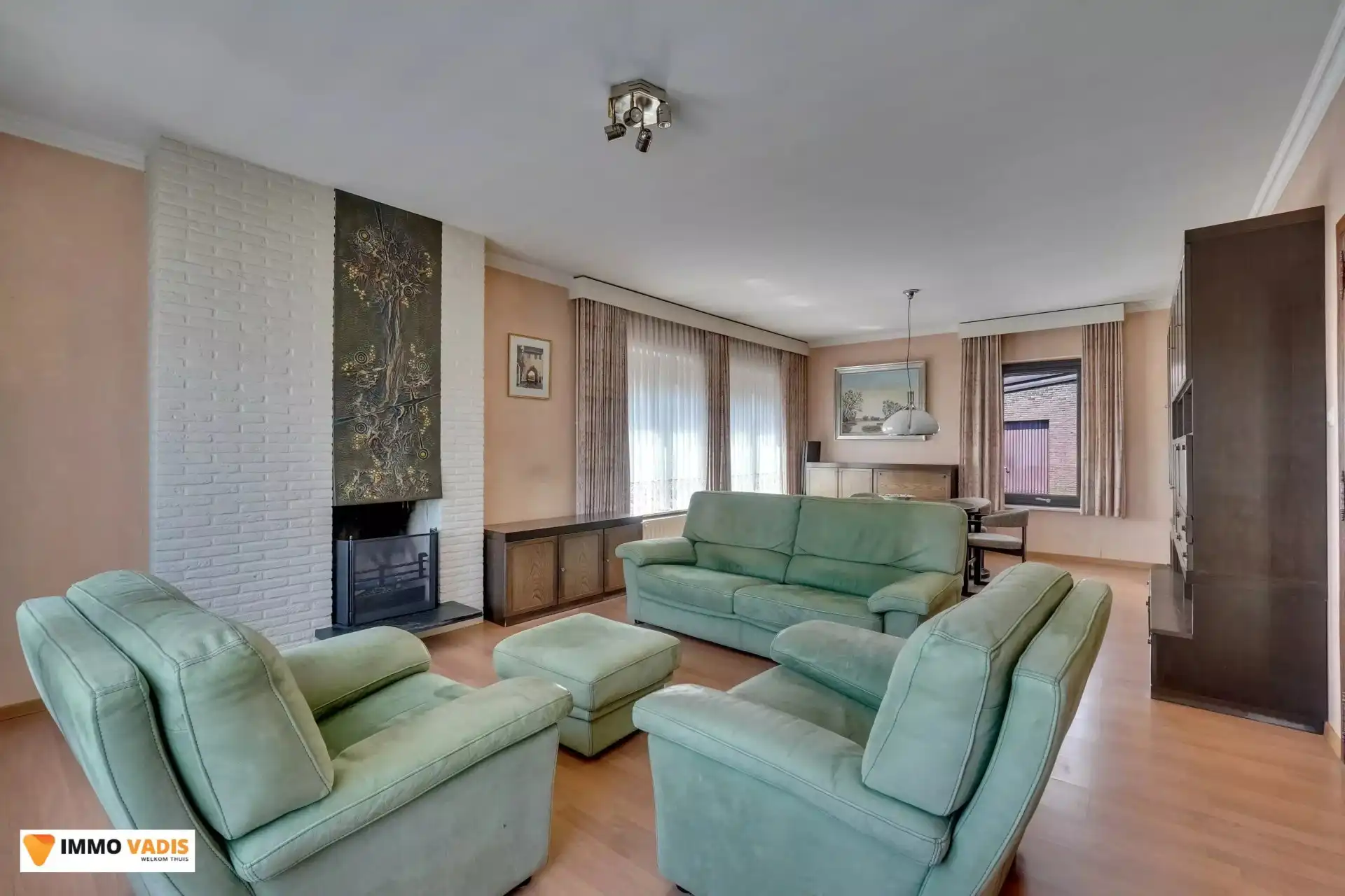 Ruime gezinswoning met 3 slaapkamers, garage en tuin foto 3