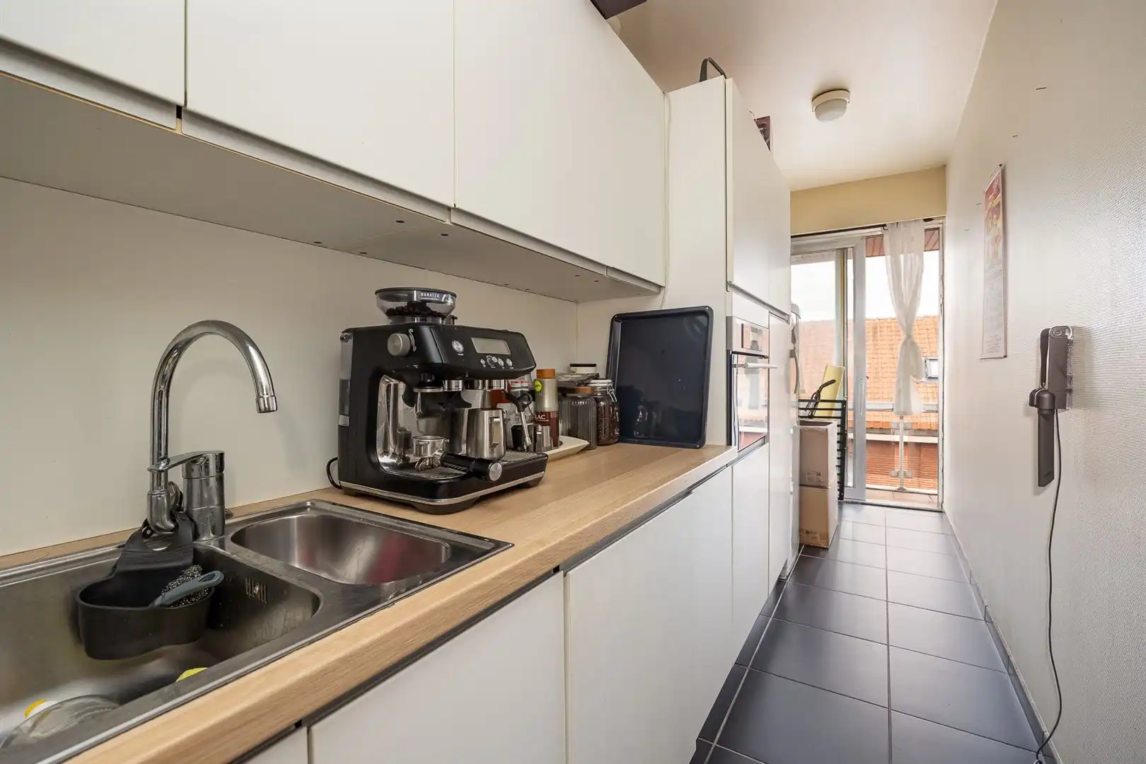 Opbrengsteigendom met 5 appartementen en garages foto 30