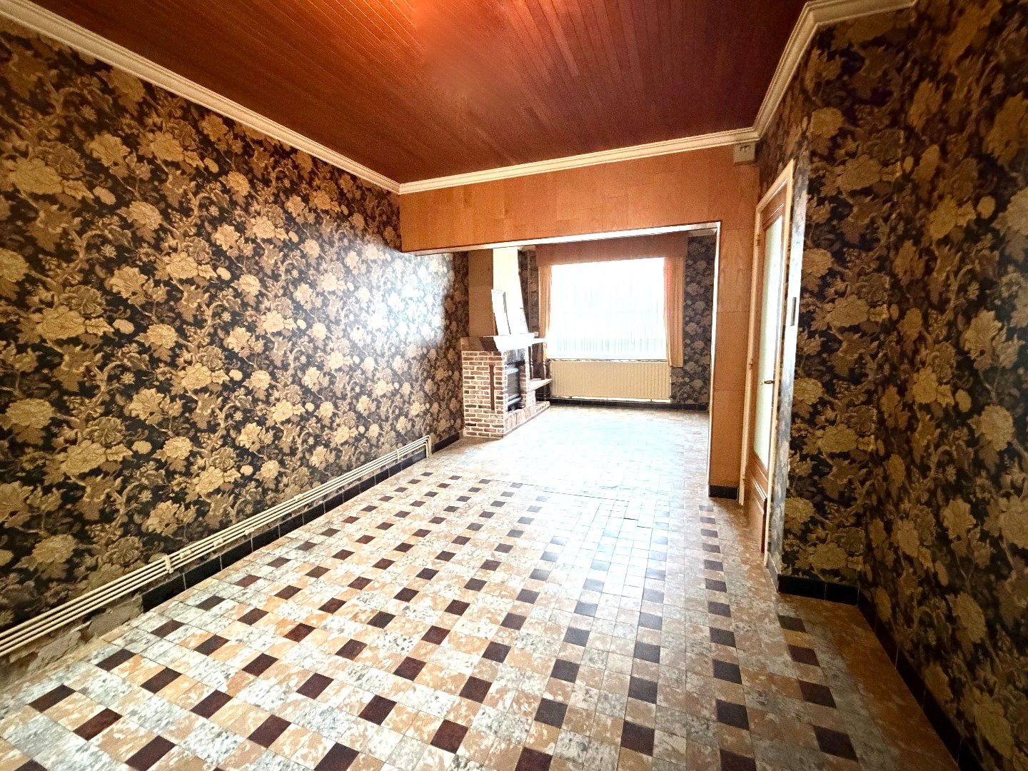 Te renoveren rijwoning met 4 slaapkamers en tuin in Kortrijk foto 3