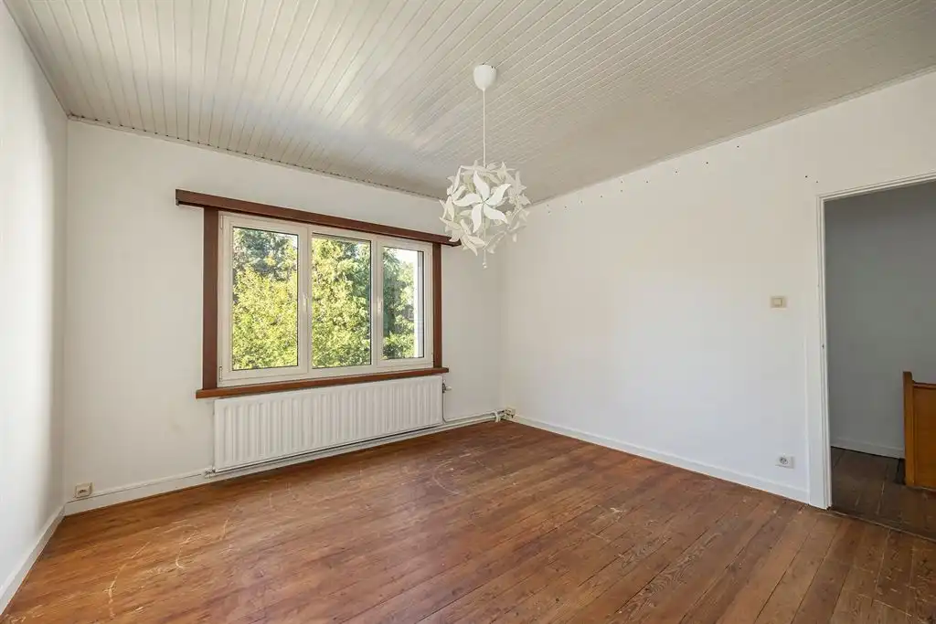 Op te frissen gezinswoning met tuin in Groenenhoek foto 14