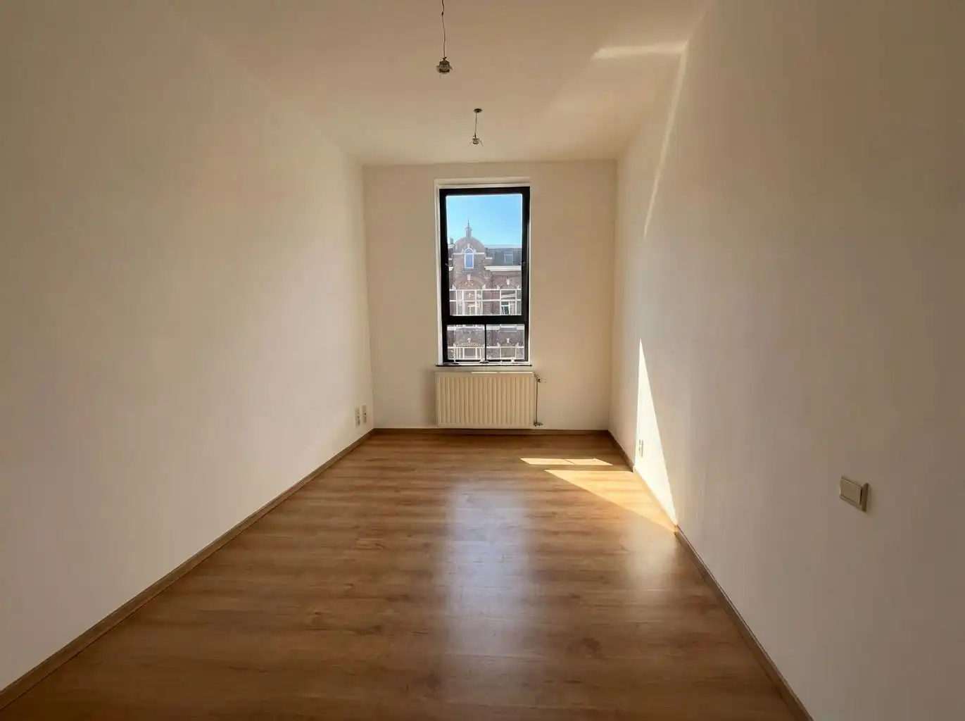 Zeer ruim 2-slaapkamer appartement met groot terras in het centrum van Bree.  foto 7