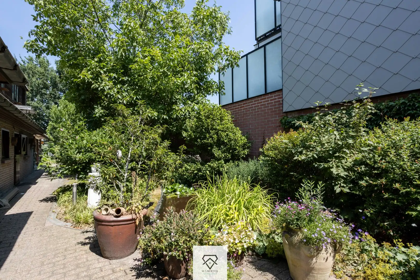 Ruime halfopen bebouwing met EPC A op 869 m² in Evergem foto 19