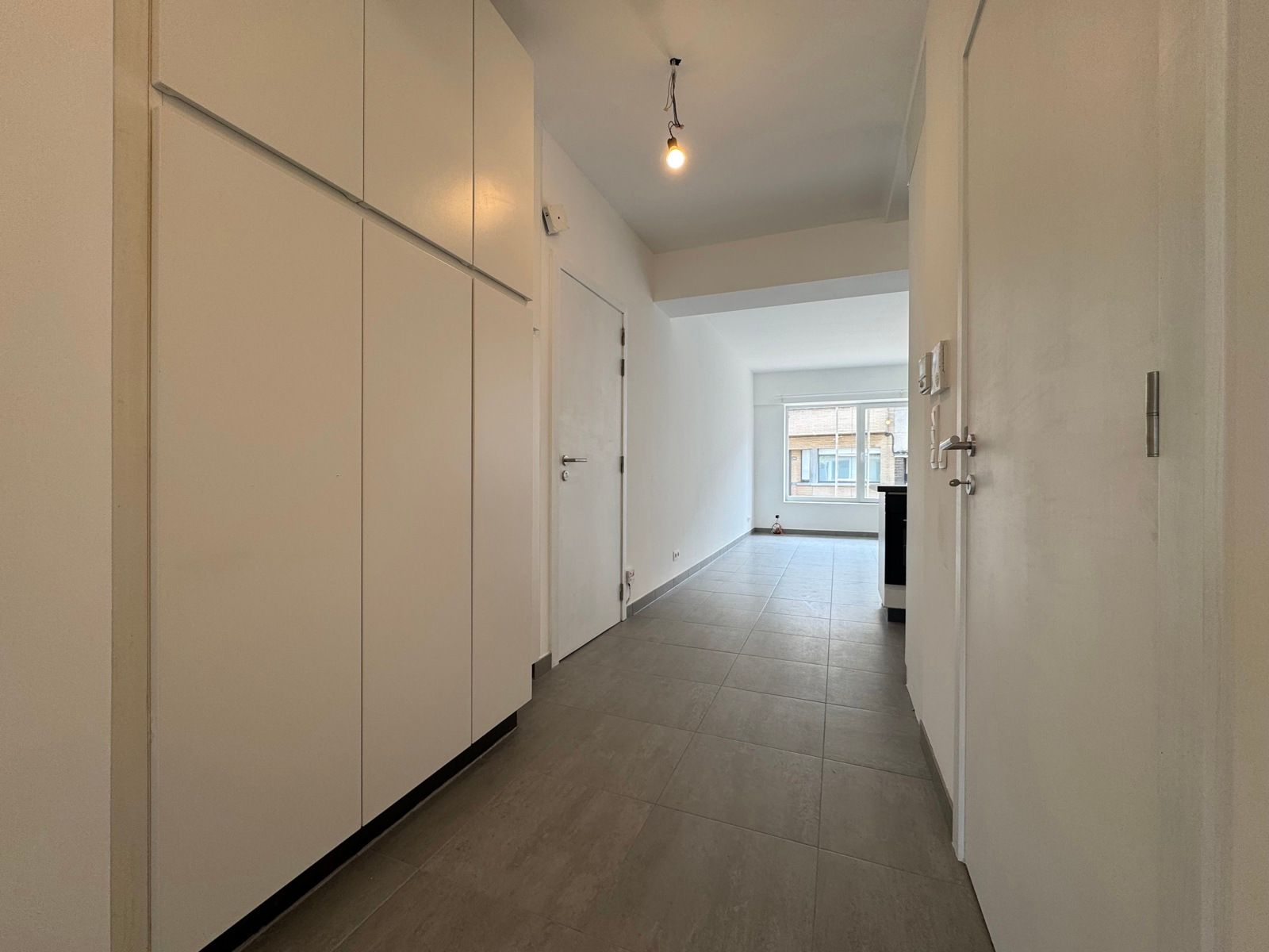 Te huur: gerenoveerd gelijkvloers appartement met tuintje foto 8